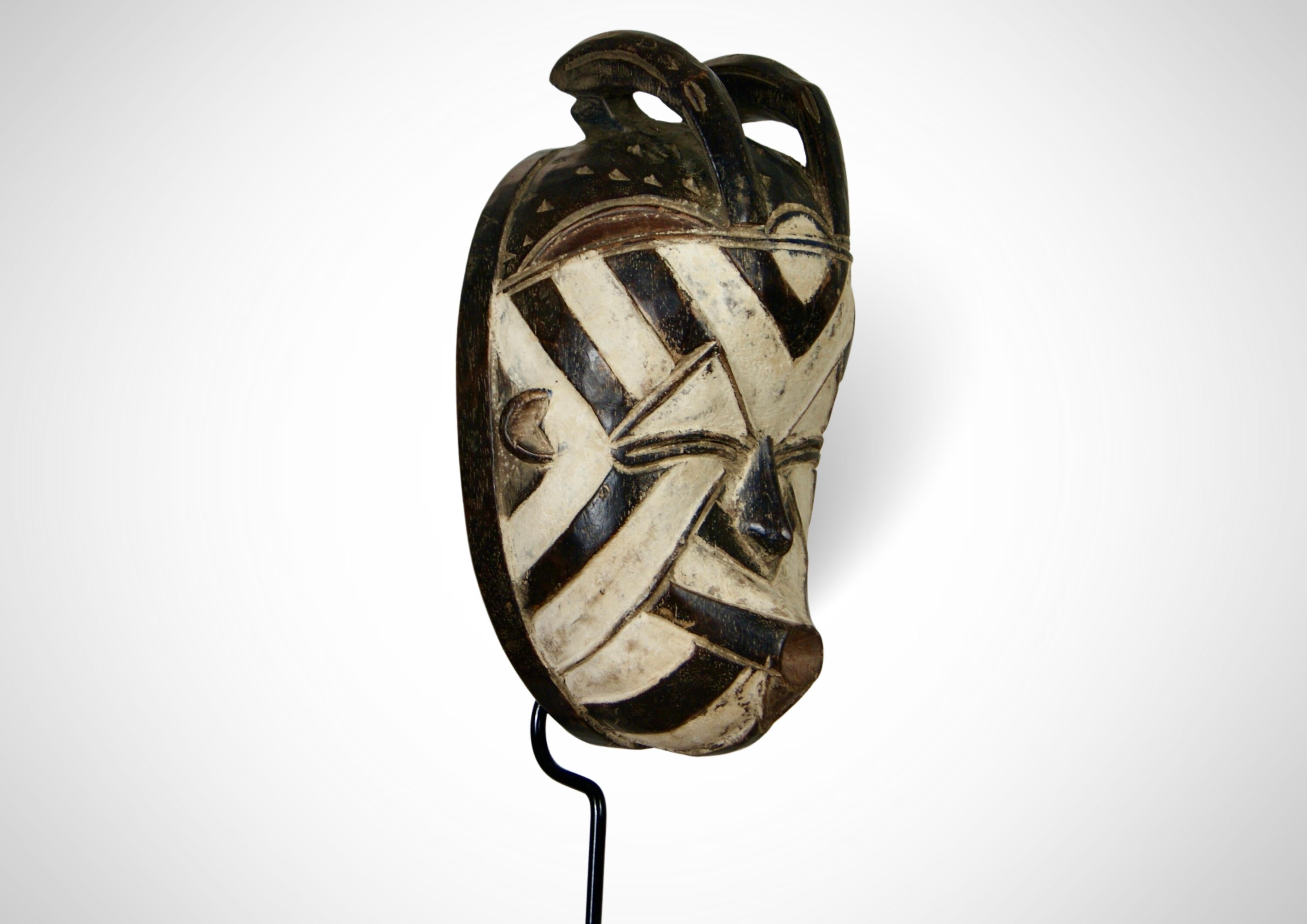 Tribal Songye Basangwe Mask DRC Wall Hanging Mask Circa 1950s For Sale