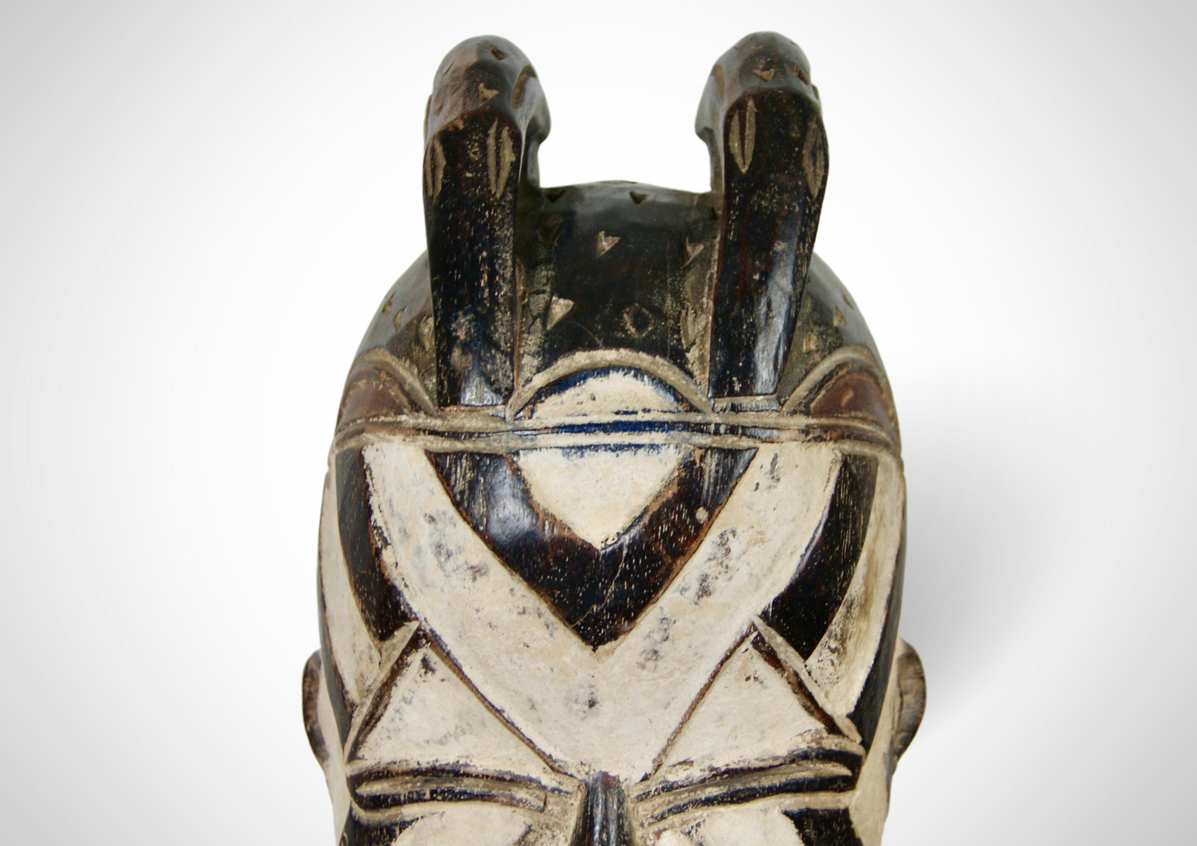 Wood Songye Basangwe Mask DRC Wall Hanging Mask Circa 1950s For Sale