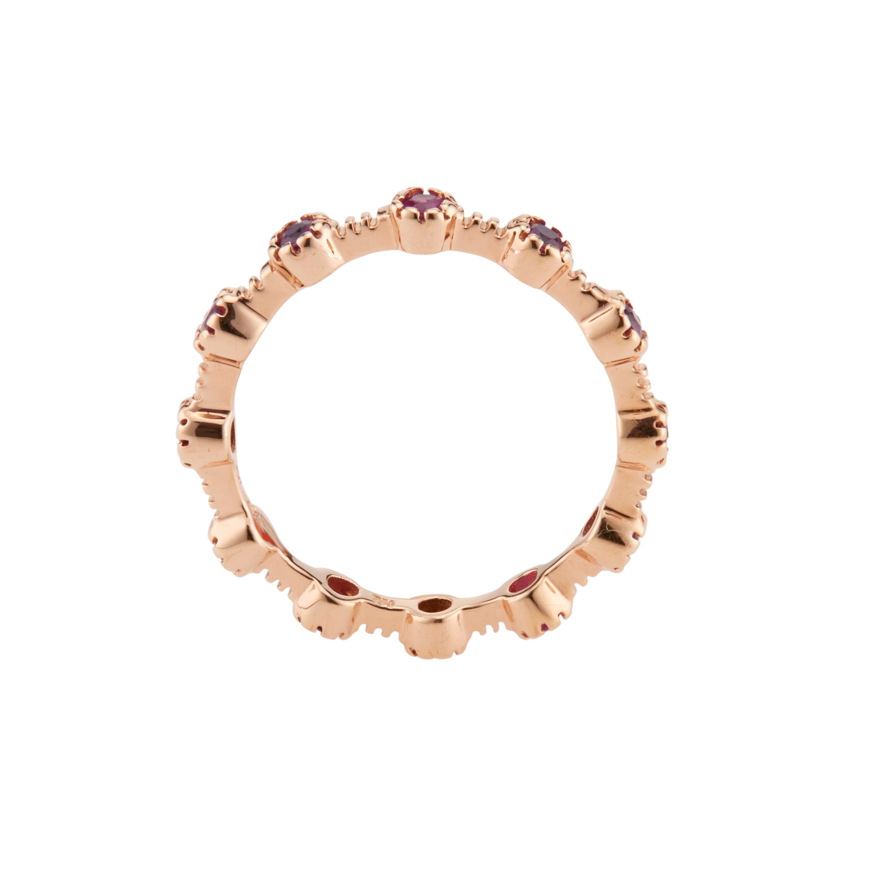 Sonia B.  ruby eternity wedding band. 12 round rubies in a 18k rose gold eternity band. 

12 round rubies approx. total weight 1.10cts.
Size 8 
Weight: 2.4 grams
18k rose gold
Stamped Sonia B. stamp is worn. 