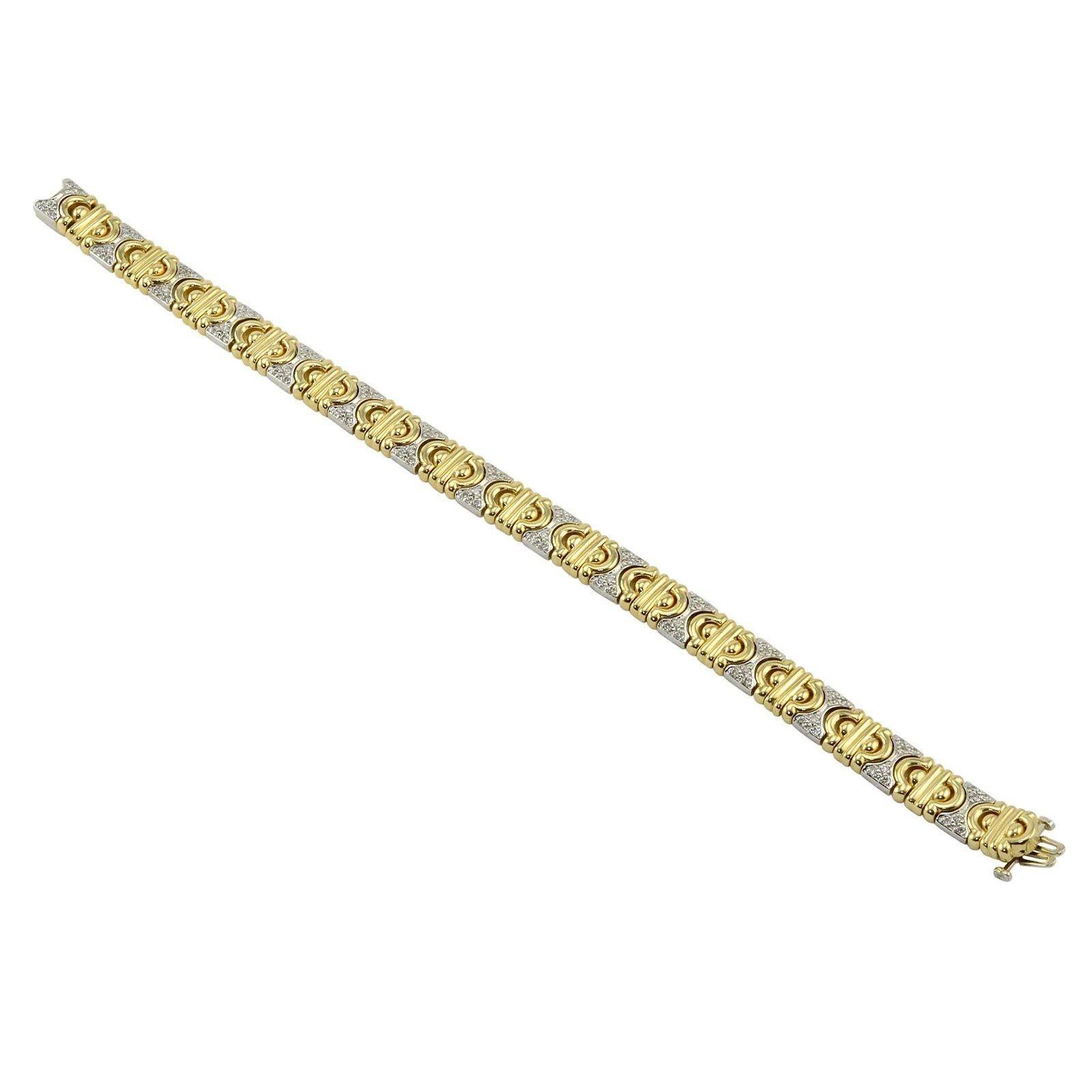 Estate Sonia B 1.17 CTW pave diamond hinged link bracelet. This 8-3/8 inch 14 karat yellow and white gold Sonia B bracelet has 90 full cut pave set diamonds at 1.17 carat total weight SI1-I1 clarity I-J color. This two tone gold diamond bracelet