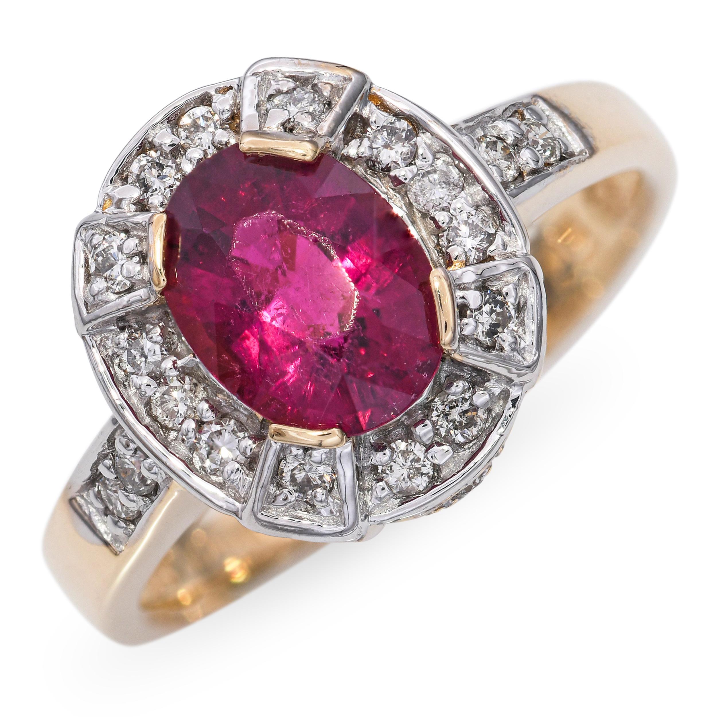 Sonia B. 14k Yellow Gold Rubellite and Diamond Ring, showcasing a richly hued rubellite tourmaline at its center. The vibrant pinkish-red tone of the rubellite is enhanced by a sleek yellow gold mounting that highlights its brilliance. Accented with