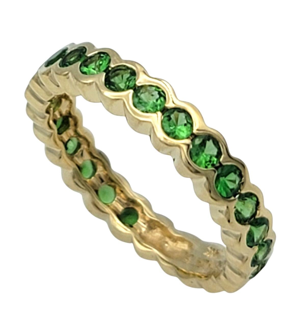 Ring Size: 7.75

Add a touch of vibrant elegance to your collection with this exquisite semi-eternity band ring by Sonia B. Crafted in 14 karat yellow gold, this stackable ring features a bubble bezel setting that showcases a stunning row of