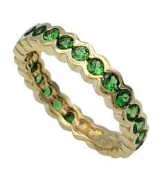 Sonia B. Bague semi-éternité en or jaune 14 carats sertie de tsavorites serties sur le chaton