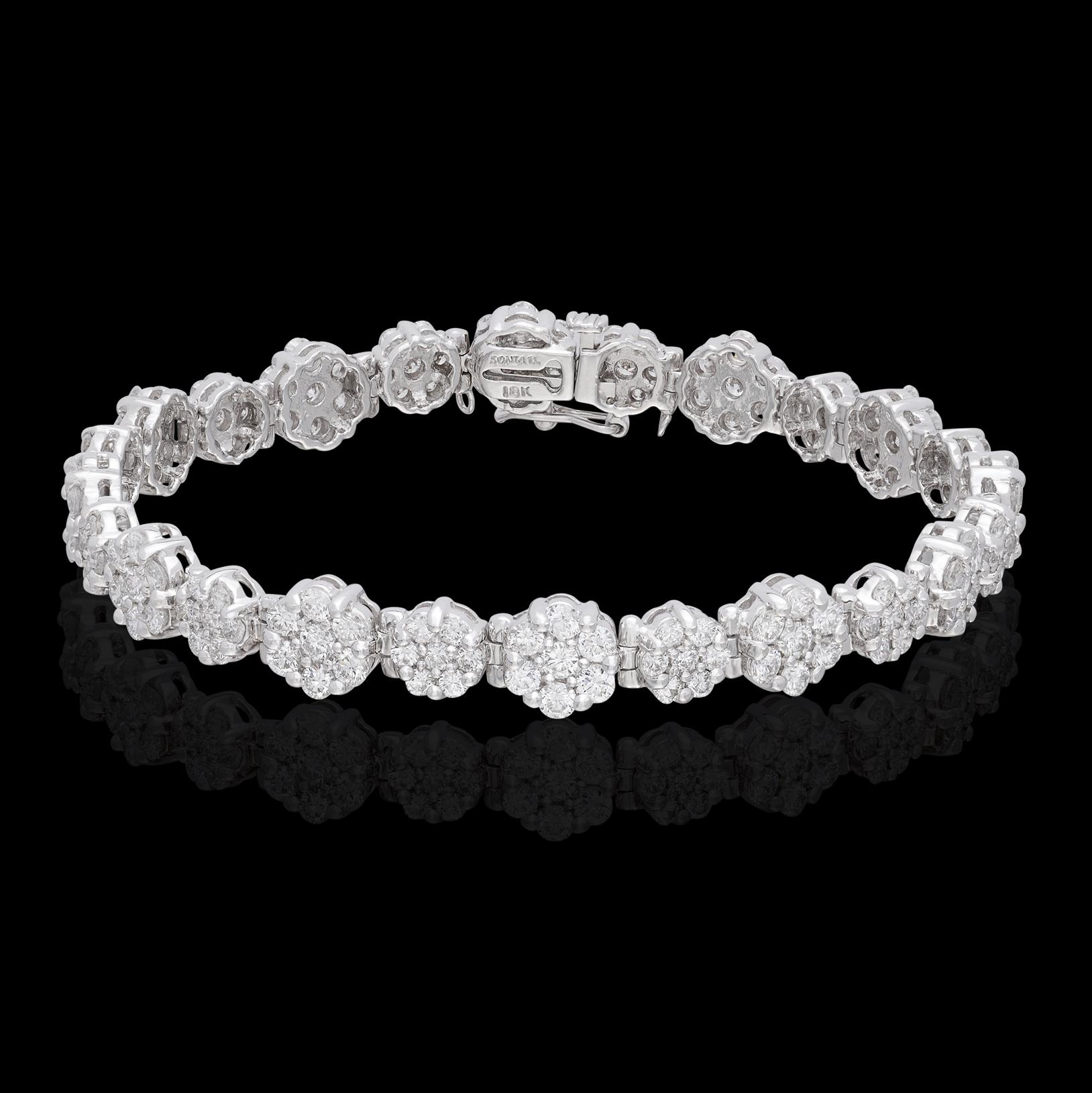 Elegant and sparkling, this 18k white gold Sonia B. bracelet is a 'must have'! Designed with alternating large and small floret links, set throughout with 168 round brilliant-cut diamonds, G-H/VS, totaling an estimated 6.42 carats. The bracelet