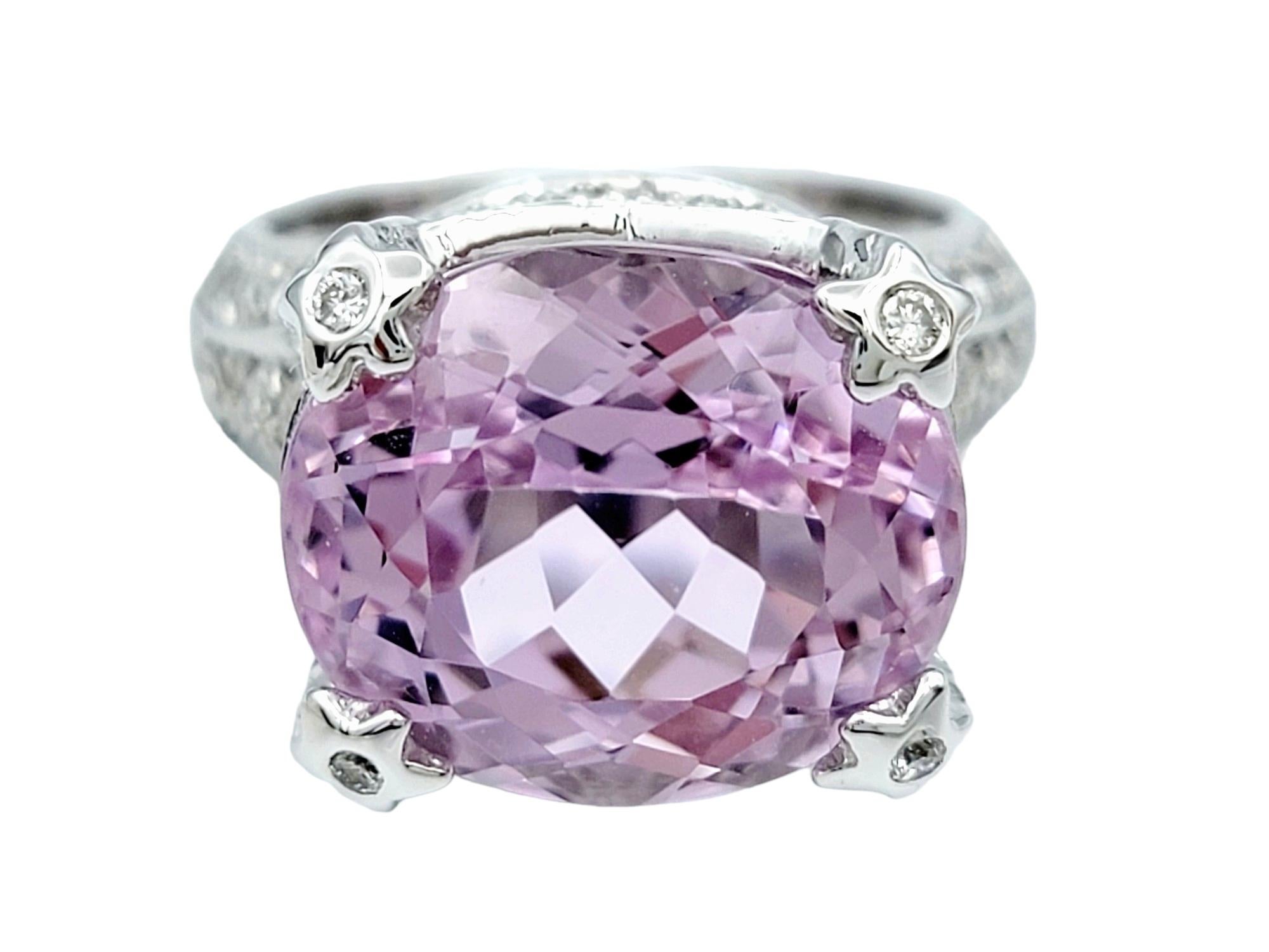 Ring size: 5.75

This scintillating ring by Sonia B. features an artfully detailed pave diamond band surrounding a sensational 9.95 carat pink kunzite stone in a luxurious high profile setting. It is breathtaking, ultra feminine and simply gorgeous.