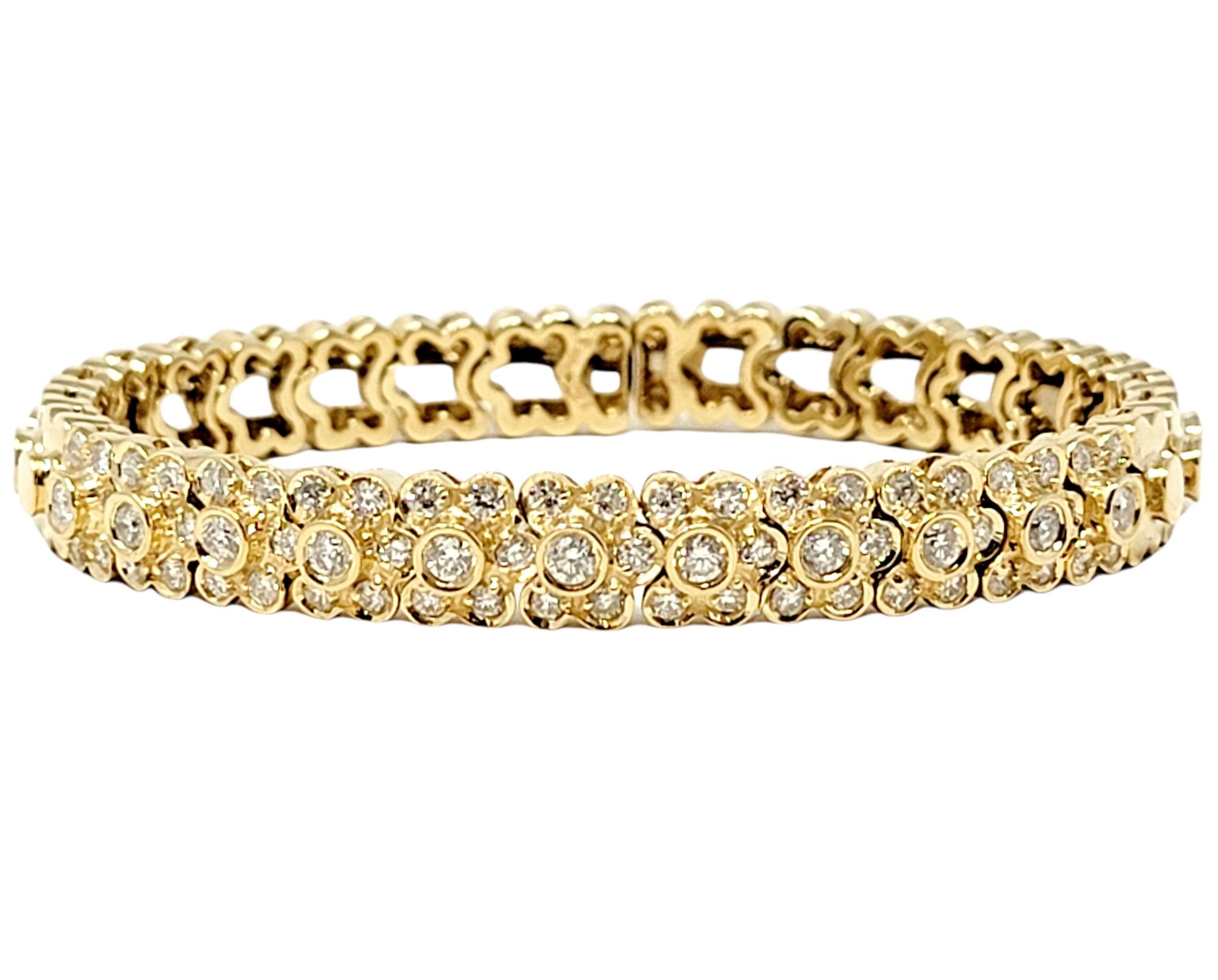 Beautiful diamond cuff bracelet by jewelry designer, Sonia B. Dressed up or down, this lovely and versatile piece is the perfect addition to your jewelry wardrobe. It features a single row of bezel and bead set natural diamonds in a gorgeous