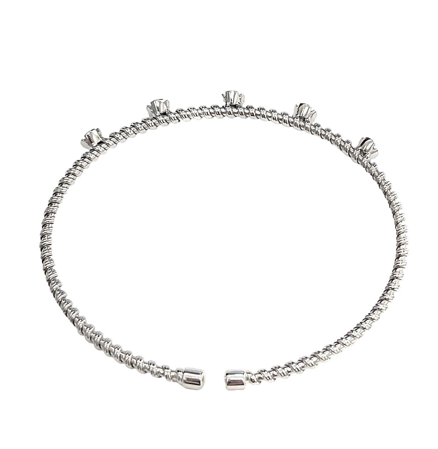 Enhance your style with a touch of brilliance using this exquisite bracelet! Five dazzling diamonds grace the front of the corkscrew cuff, captivating attention to your wrist. The greatest advantage? It's available in various plating, allowing you