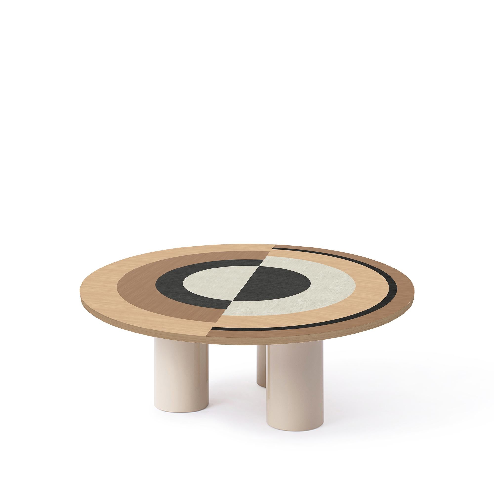Sonia et Caetera coffee table M1 designed by Thomas Dariel
Dimensions: 
Small: Diameter 100 x Height 37 cm 
Large: Diameter 115 x Height 37 cm 
Materials: Top in painted ash veneer, fronts in the matte paint finish, Structure in MDF, Metal legs