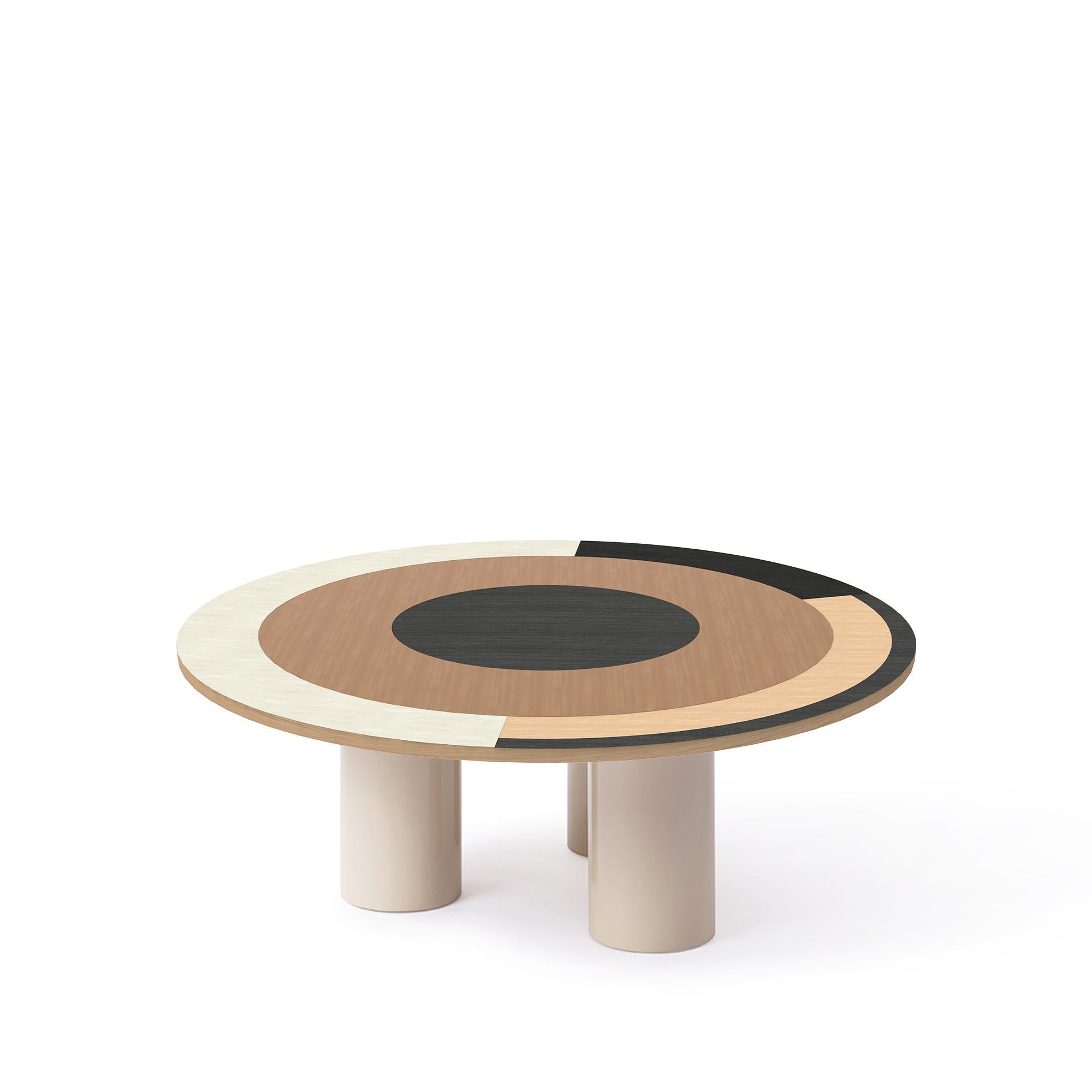 Sonia et caetera coffee table M2 designed by Thomas Dariel
Dimensions: 
Small: diameter 100 x height 37 cm 
Large: diameter 115 x height 37 cm 
Materials: Top in painted ash veneer, fronts in the matte paint finish, Structure in MDF, Metal legs