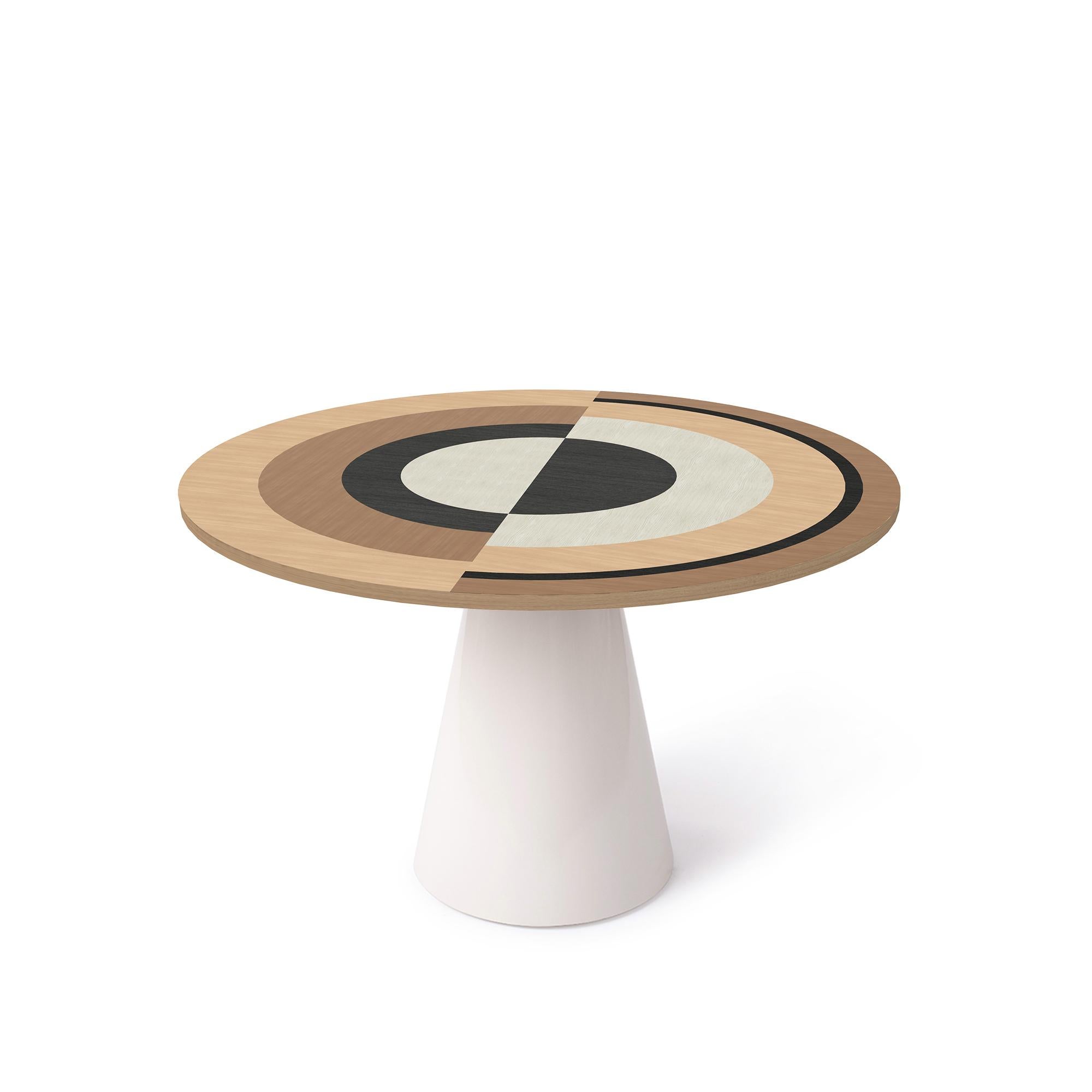 Sonia et Caetera dining table M1 designed by Thomas Dariel
Dimensions: 
Small: Diameter 100 x Height 74 cm 
Medium: Diameter 115 x Height 74 cm 
Large: Diameter 130 x Height 74 cm 
Materials: Top in painted ash veneer, fronts in the matte paint