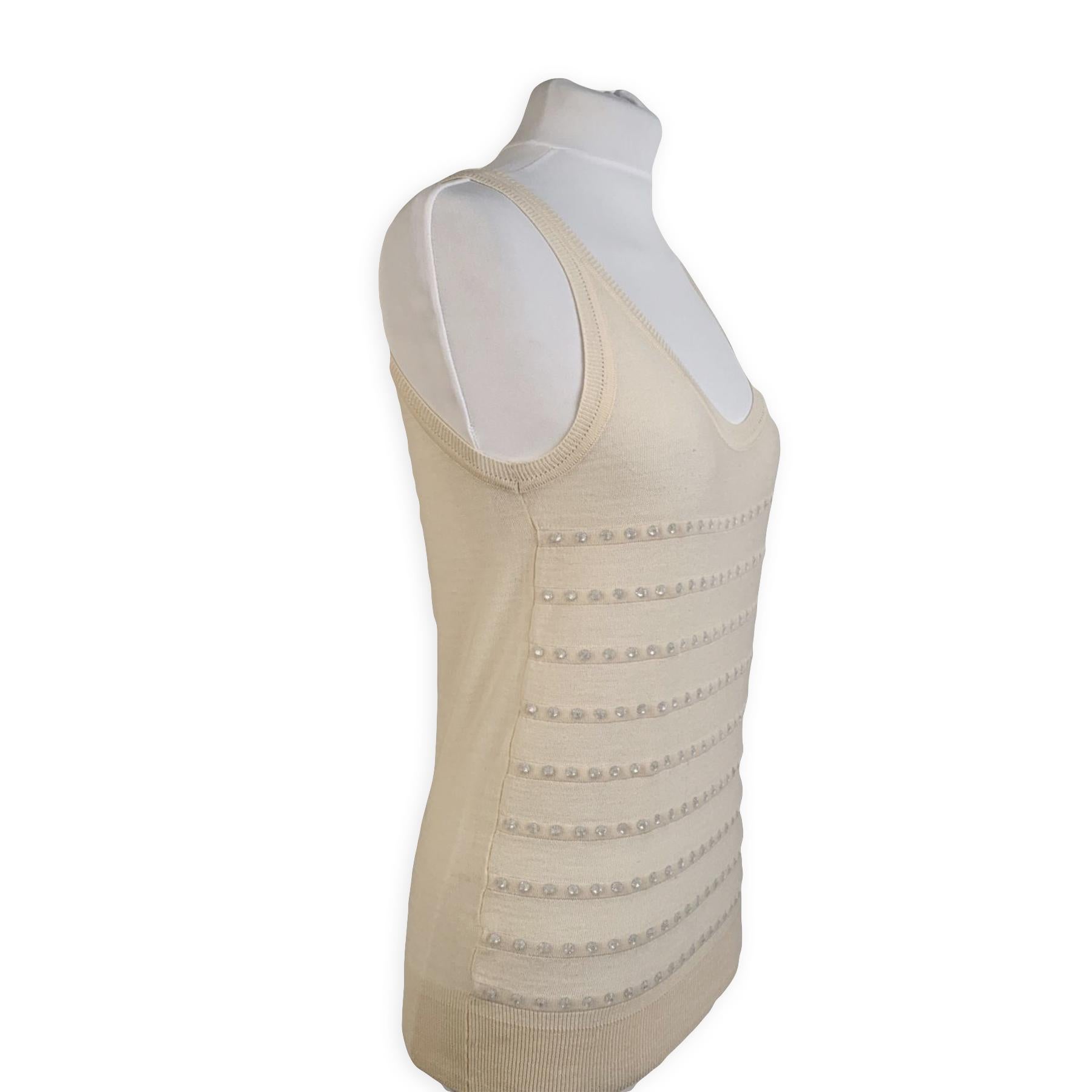 Sonia Rykiel sleeveless tank top with rhinestones embellishment. Composition: 90% Wool, 8% Cotton, 2% Nylon. Sleeveless design and scoop neckline. Size: 36 FR (It should correspond to a SMALL size). Made in Italy.



Details

MATERIAL: Wool