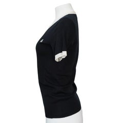 Sonia Rykiel - Polo en coton noir et crème avec boutons à l'ancre