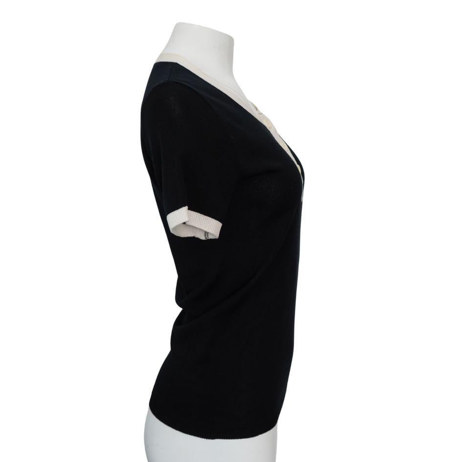 Noir Sonia Rykiel - Polo en coton noir et crème avec boutons à l'ancre en vente
