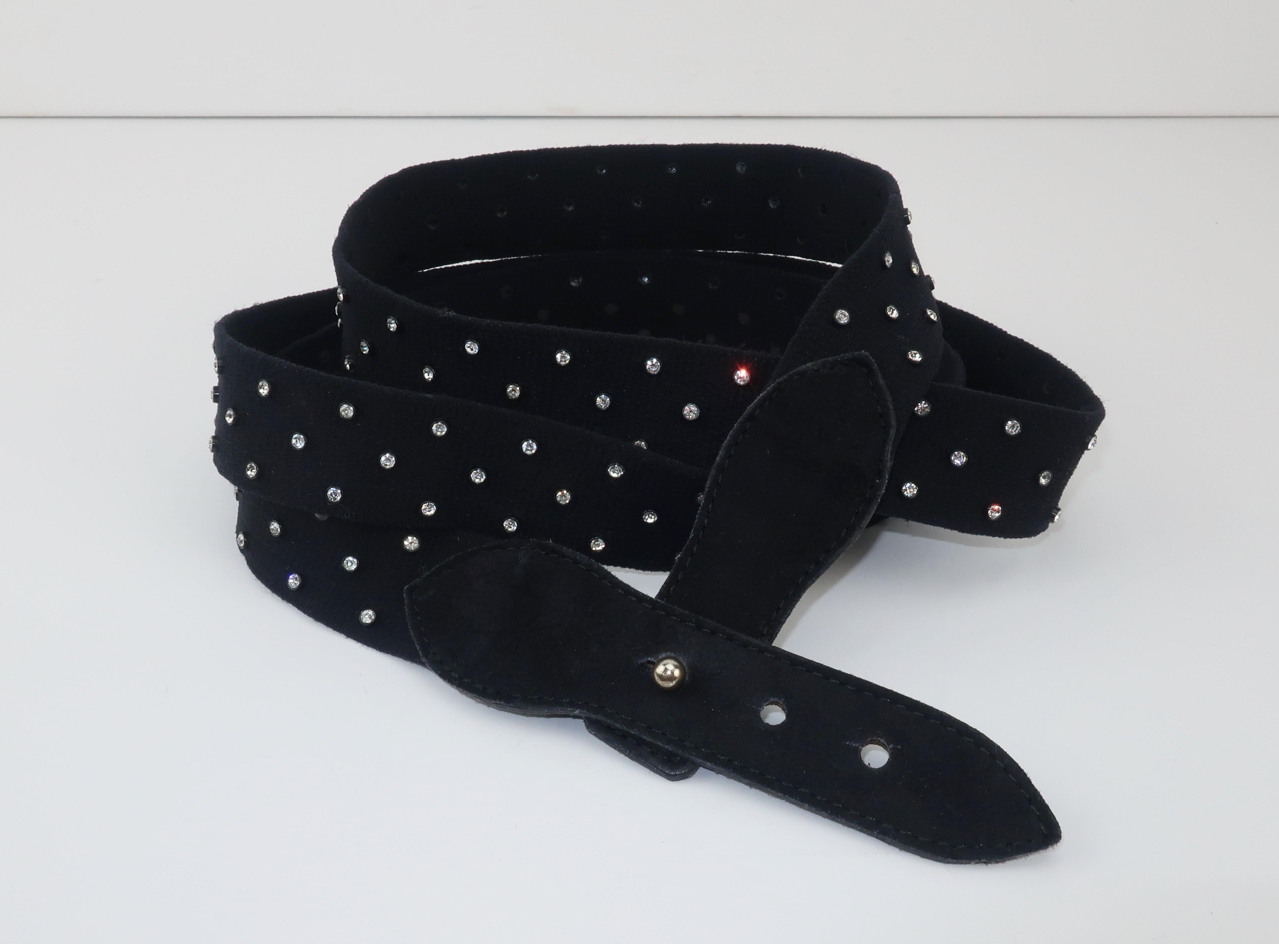 A unique Sonia Rykiel belt combining a crystal rhinestone black stretch body with suede tack style adjustable buckle.  The belt is designed to wrap and can be worn in a number of imaginative ways including the option to create a harness effect. 