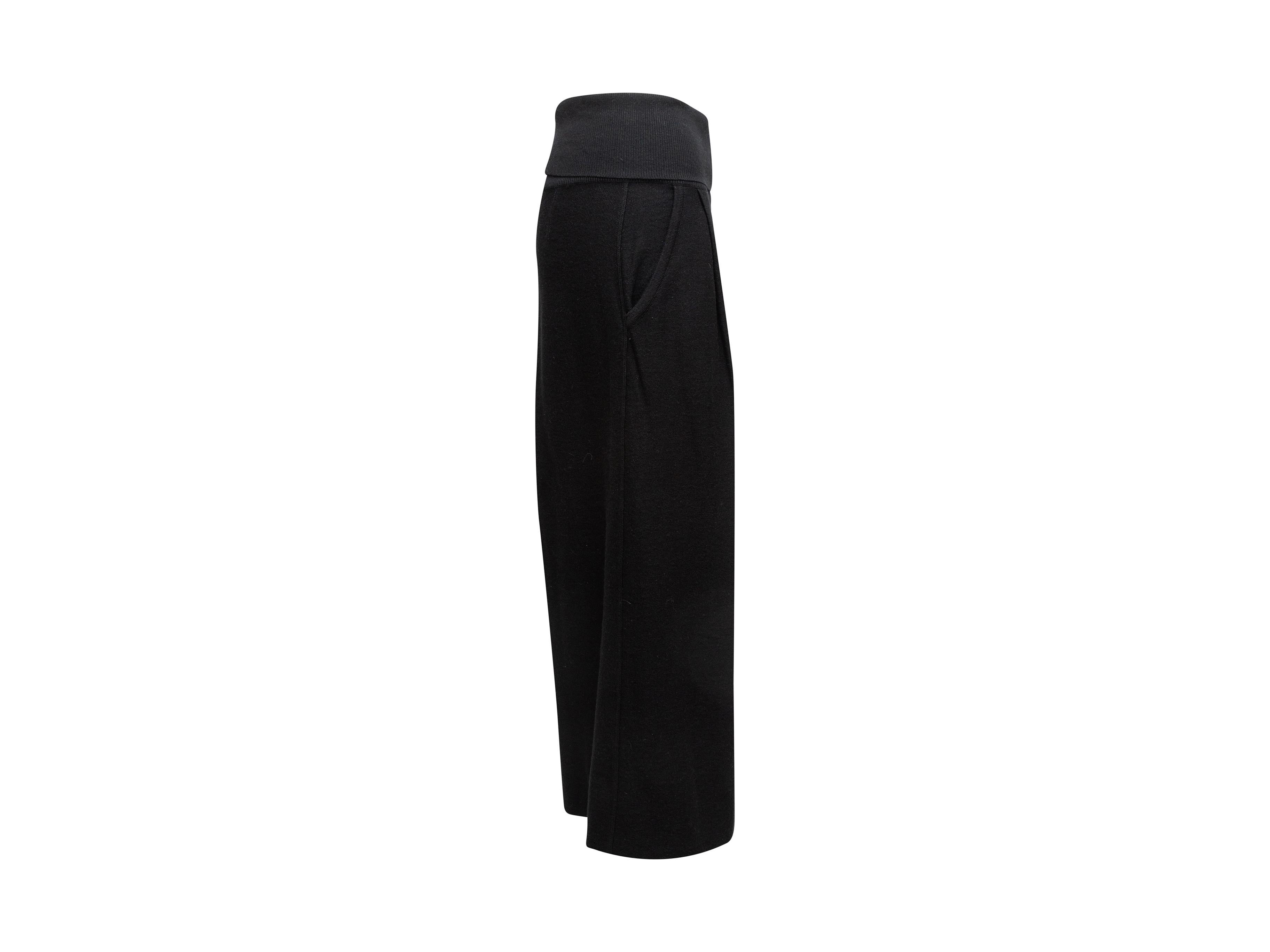 Product details: Black virgin wool and angora culottes by Sonia Rykiel. Dual hip pockets. Designer size 38. 26