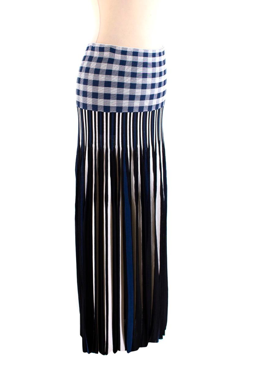 Sonia Rykiel Blue & White Striped Check Maxi Skirt

-Blue and white striped skirt
-A line skirt
-Blue and white check panel
-Elasticated waistband

Please note, these items are pre-owned and may show signs of being stored even when unworn and