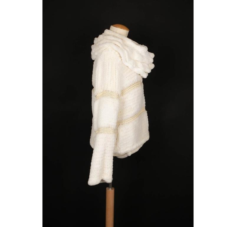 Sonia Rykiel - Jacket made of rex rabbit, and lamb and calf leather. Size 38FR.

Additional information:
Condition: Very good condition
Dimensions: Shoulder width: 43 cm - Sleeve length: 66 cm - Length: 62 cm

Seller Reference: FV133