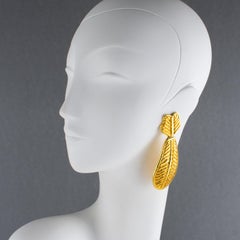 Sonia Rykiel - Boucles d'oreilles pendantes avec fleurs dorées et motif palmier
