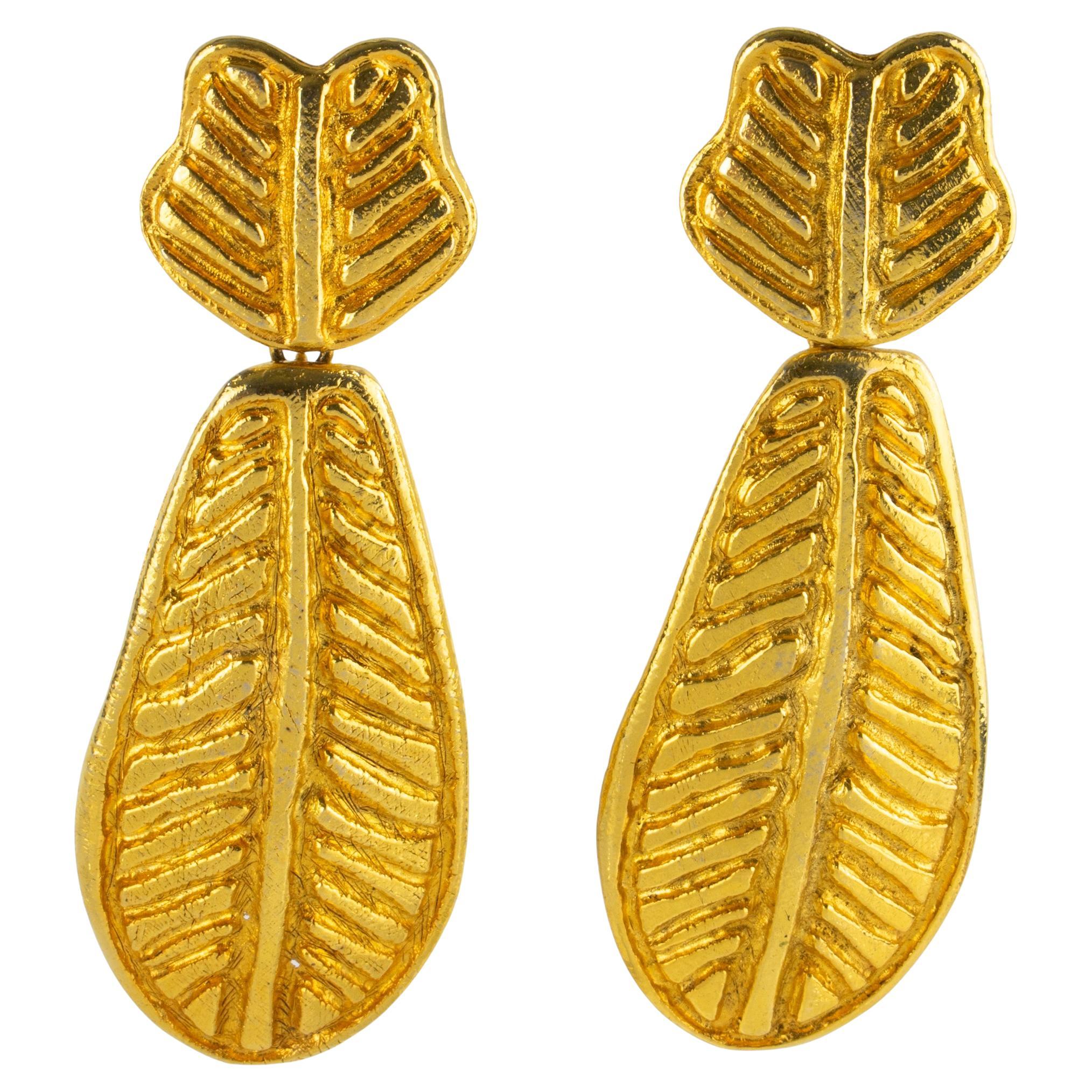 Sonia Rykiel - Boucles d
oreilles pendantes avec fleurs dorées et motif palmier en vente