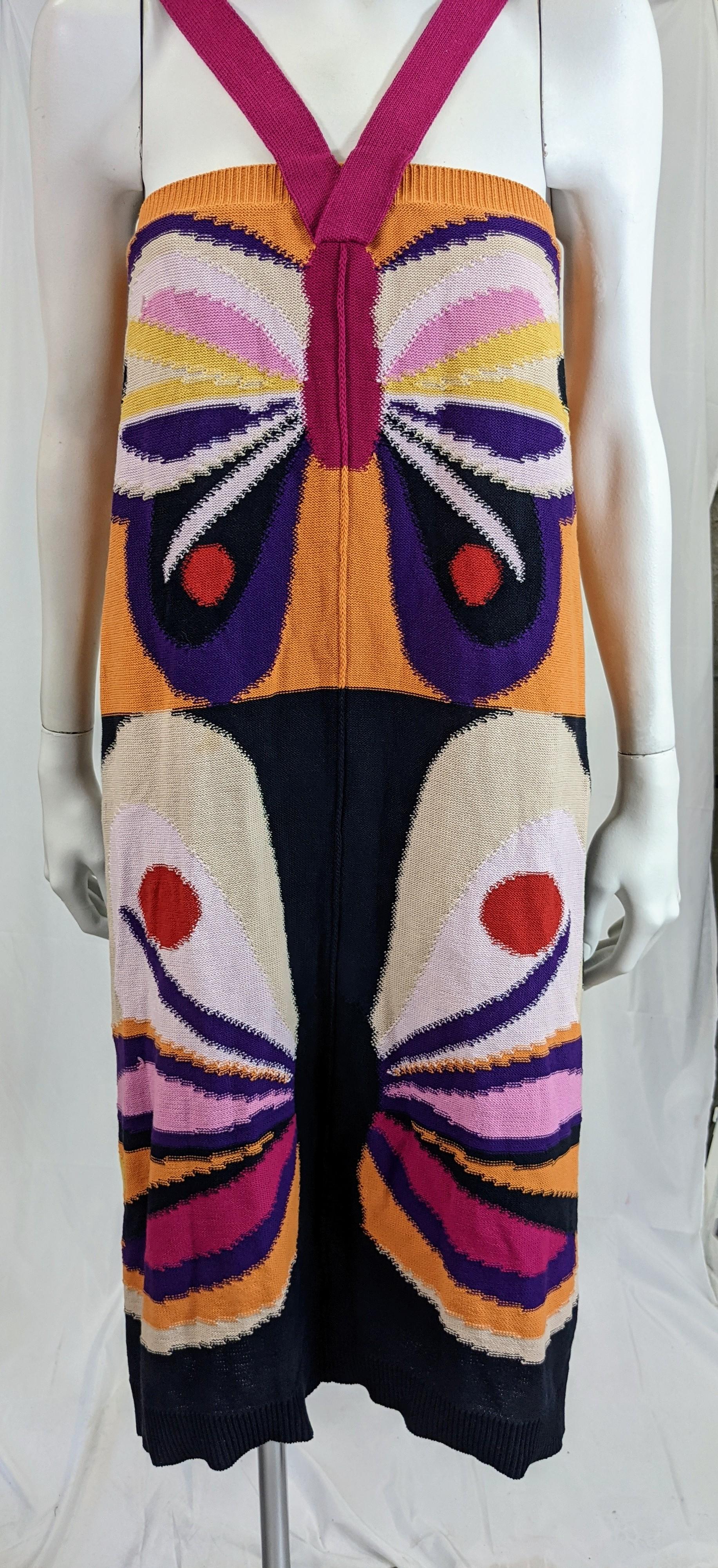Sonia Rykiel's wonderful cotton knit butterfly dress. The loose fitting dress front is divided into two orange and black registers of two graphic butterflies in various shades of pinks while the back registers are plain.  The V shape straps form the