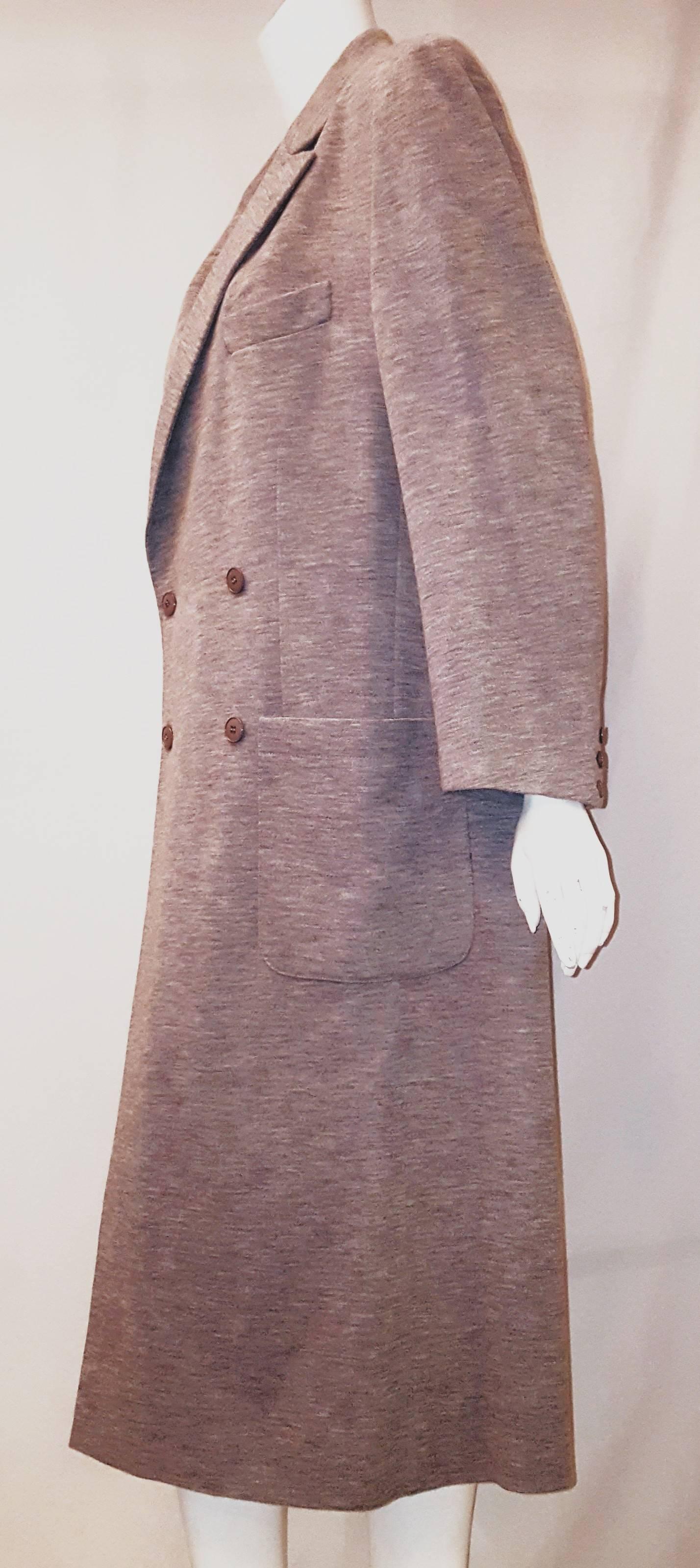Sonia Rykiel grey wool double breasted coat with 4 buttons for closure and a single button at lapel. The 