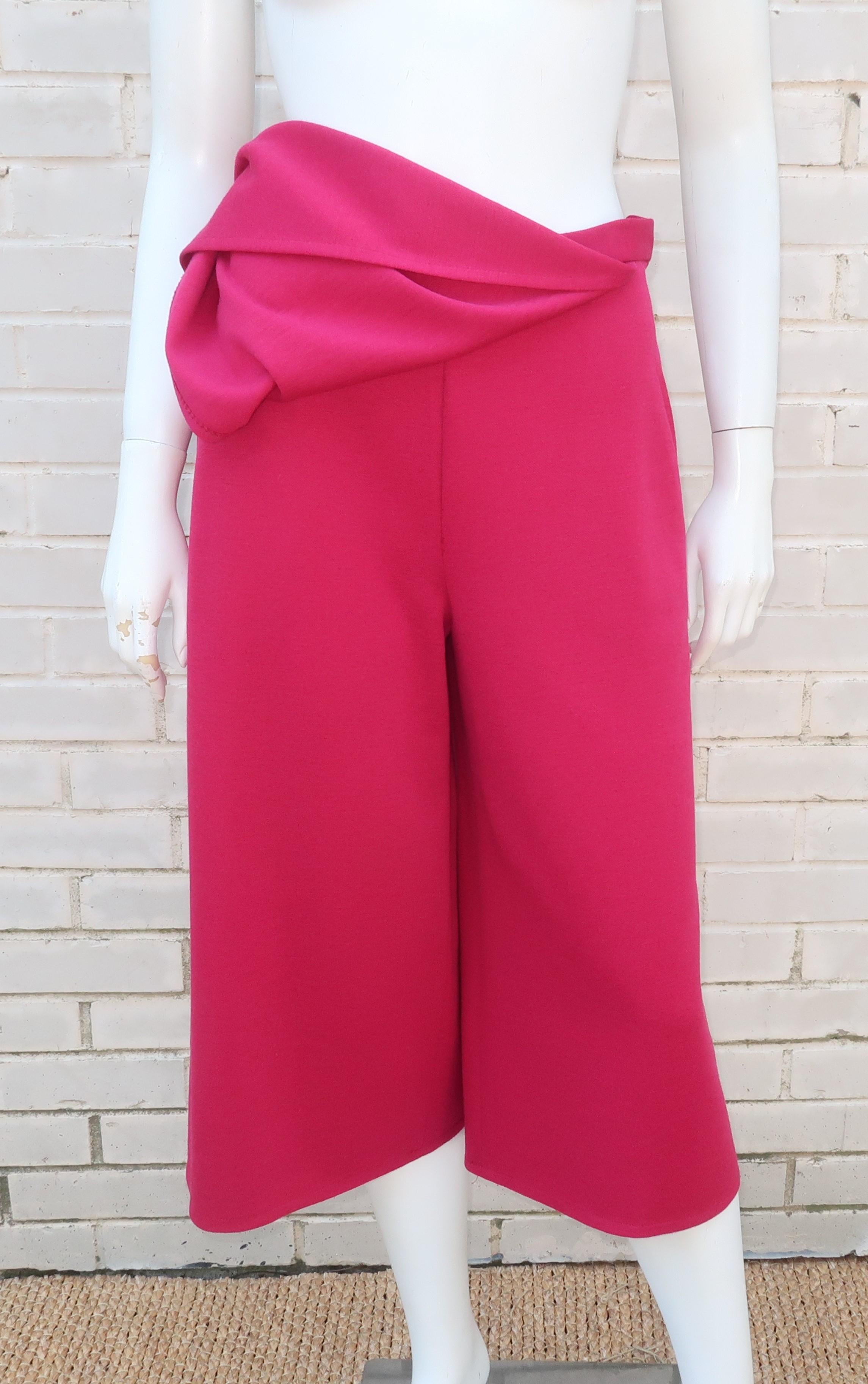 Sonia Rykiel combines the best of both worlds with this 1980's hot pink culottes skirt.  The design is fabricated from a wool knit with side closure and pockets.  Just a flip of the front panel for a look at how stylish a comfortable design can be! 