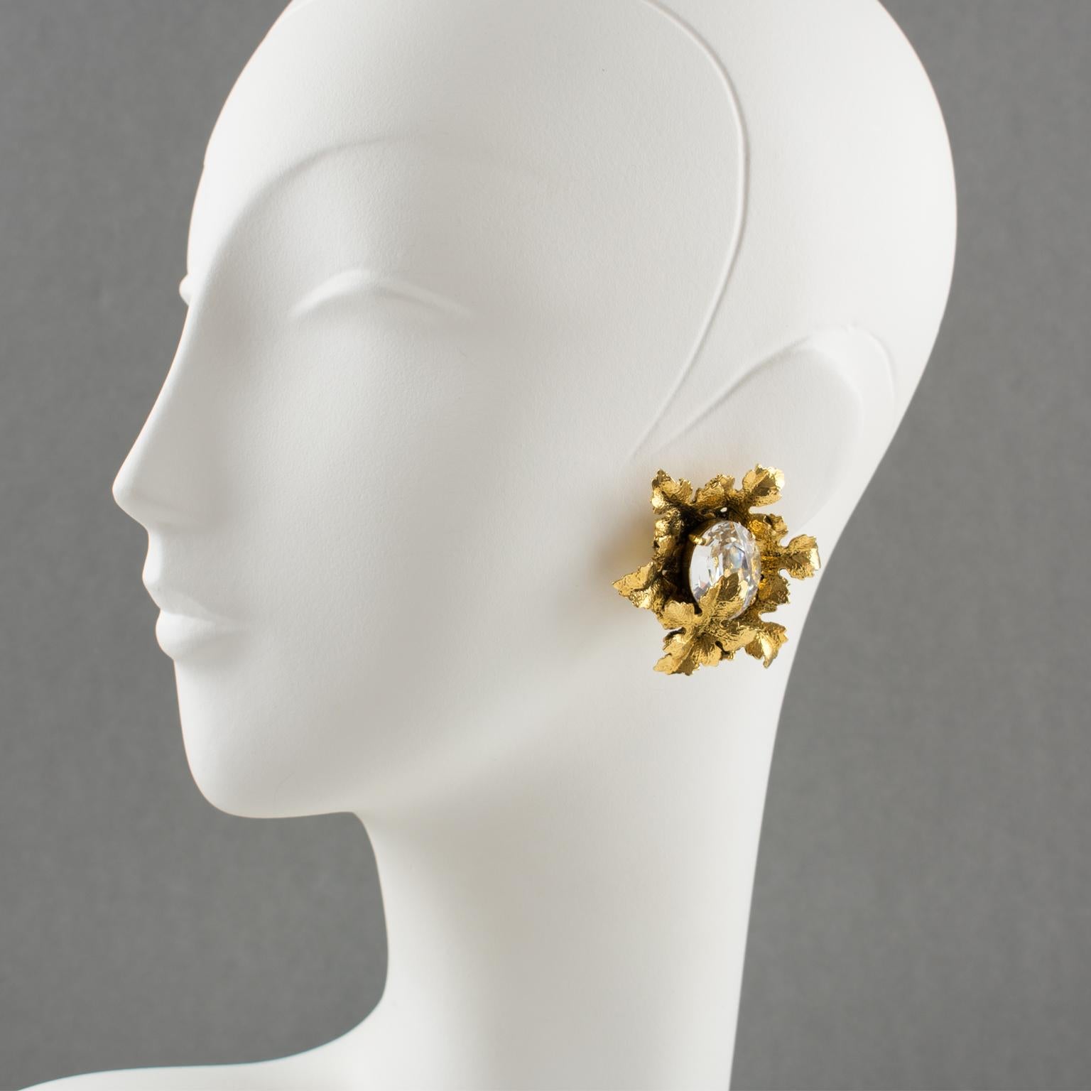 Lovely French fashion designer Sonia Rykiel Paris signed clip-on earrings. Featuring dimensional gilt metal leaves carved design with texture topped with extra-large crystal clear rhinestone. Signed underside with gilded tag: Sonia Rykiel - Paris.