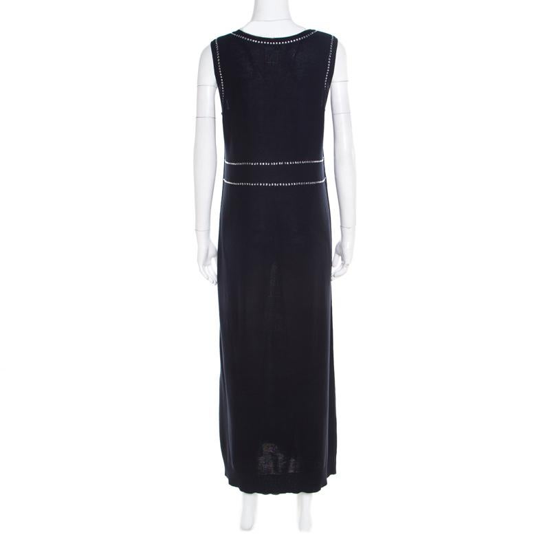 Amazingly stylish and effortlessly chic is this Trompe L'oeil Diamanté maxi dress from Sonia Rykiel! The navy blue sleeveless creation is made of 100% cotton and features crystal embellishments detailed artistically. It flaunts a scooped neckline
