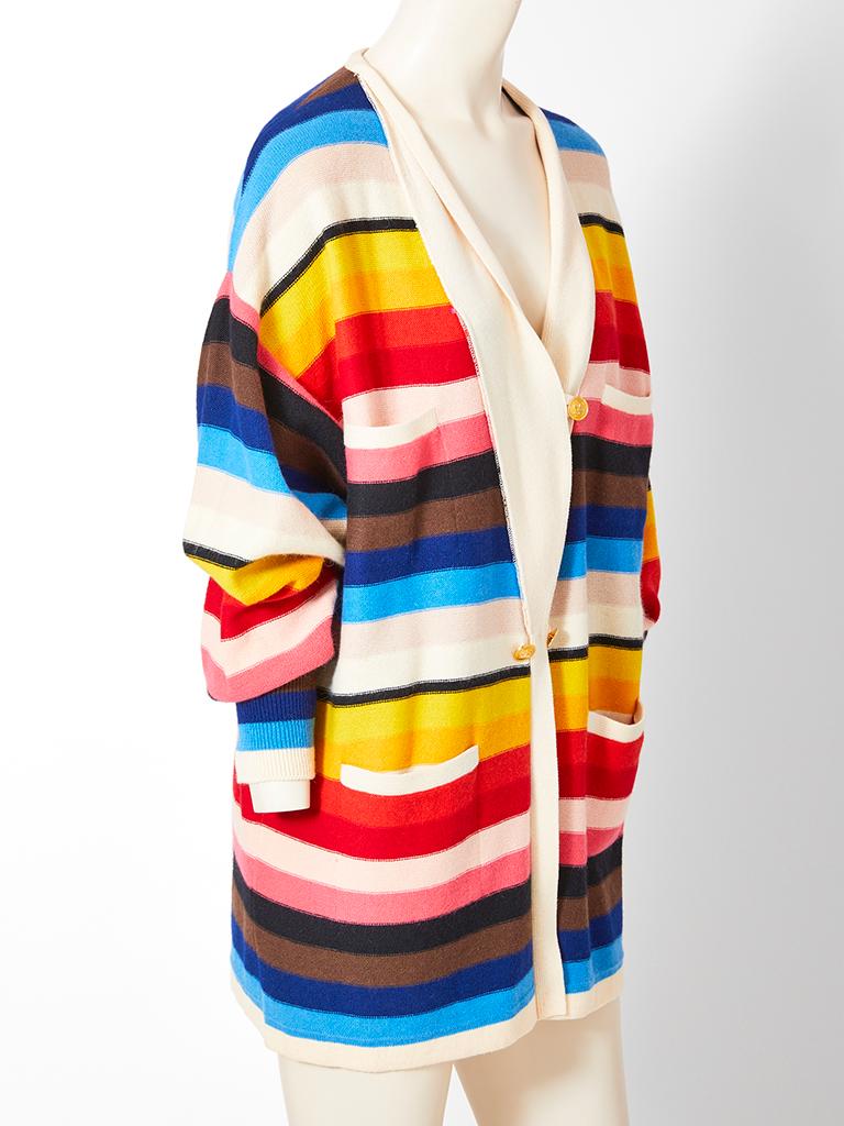Sonia Rykiel, horizontal, rainbow stripe, wool knit, oversized cardigan, having a v neckline and low placed pockets.