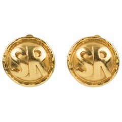 Boucles d'oreilles clip Sonia Rykiel Paris métal doré SR Logo