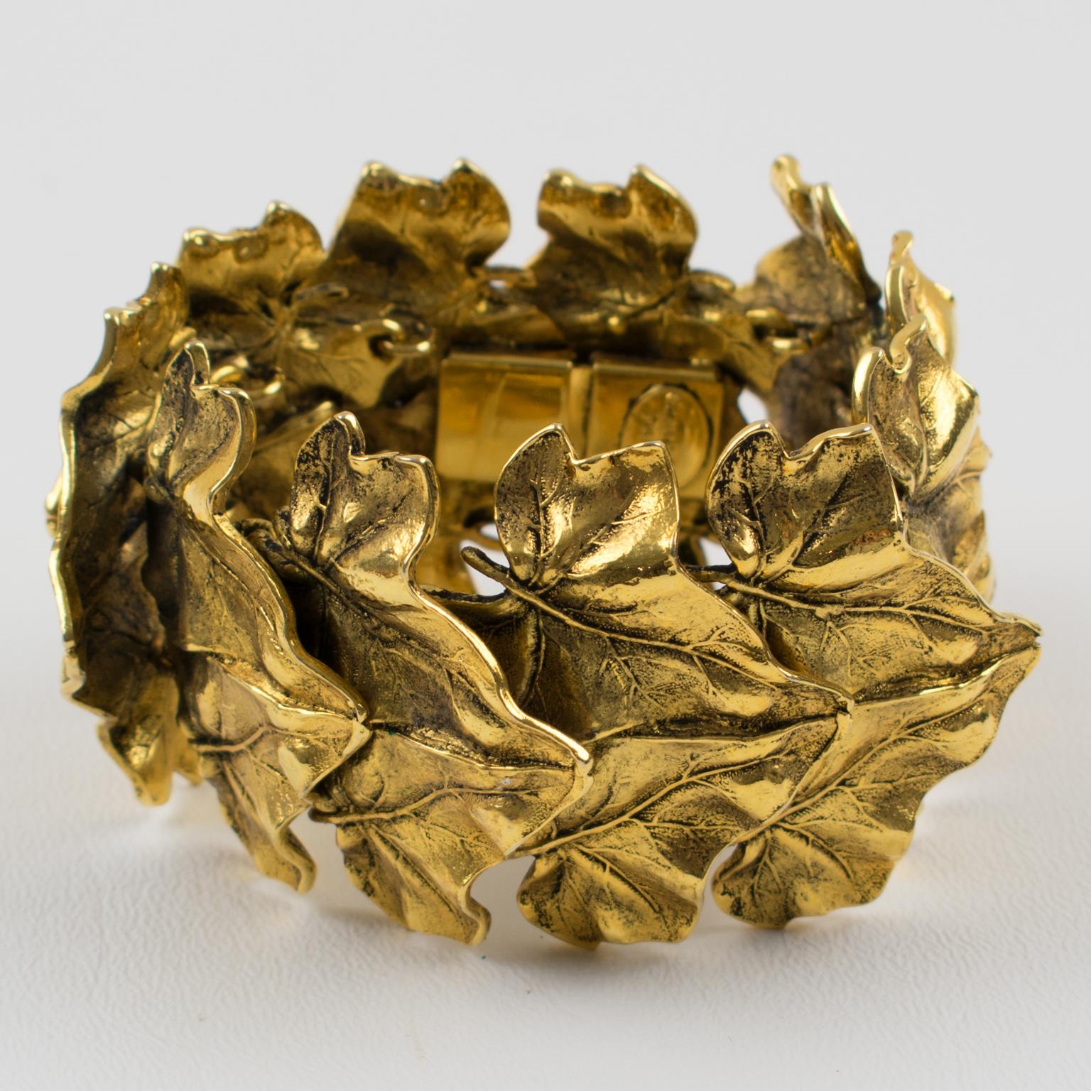 Lovely Sonia Rykiel Paris signed link bracelet. Massive articulated shape with gilt metal all textured and carved featuring large leaves. Signed by famous French Jewel and Fashion Designer Sonia Rykiel, gilded tag underside reads: Sonia Rykiel
