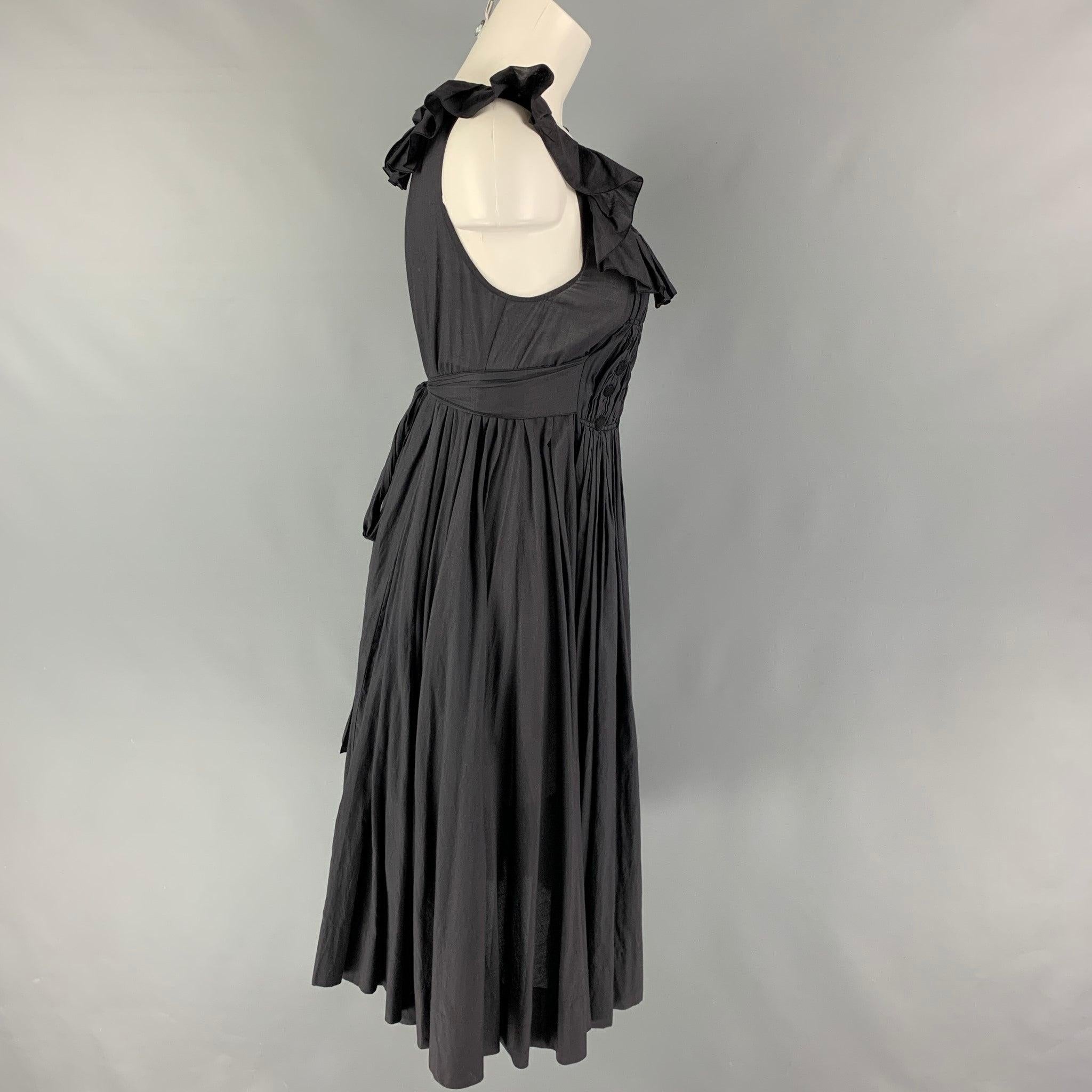 SONIA RYKIEL dress comes in a slate cotton featuring a pleated style, black applique details, and a waist belt detail.
Very Good
Pre-Owned Condition. 

Marked:   T 40 

Measurements: 
 
Shoulder: 12.5 inches  Bust: 34 inches  Waist: 34 inches  Hip: