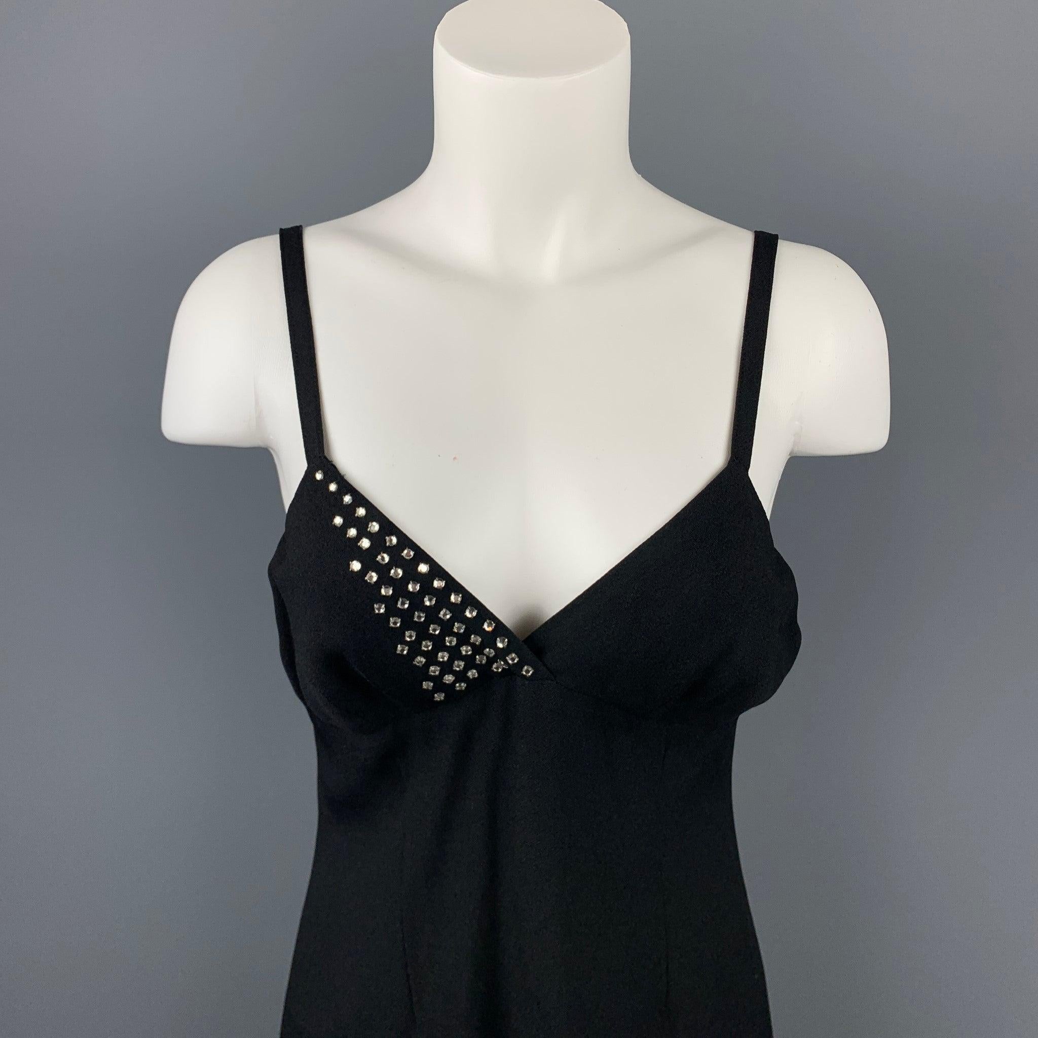 SONIA RYKIEL cocktail dress comes in a black acetate / viscose with a slip liner featuring rhinestone details featuring an a-line style, spaghetti straps, and a back zip up closure. Made in France.Very Good
Pre-Owned Condition. 

Marked:   40

