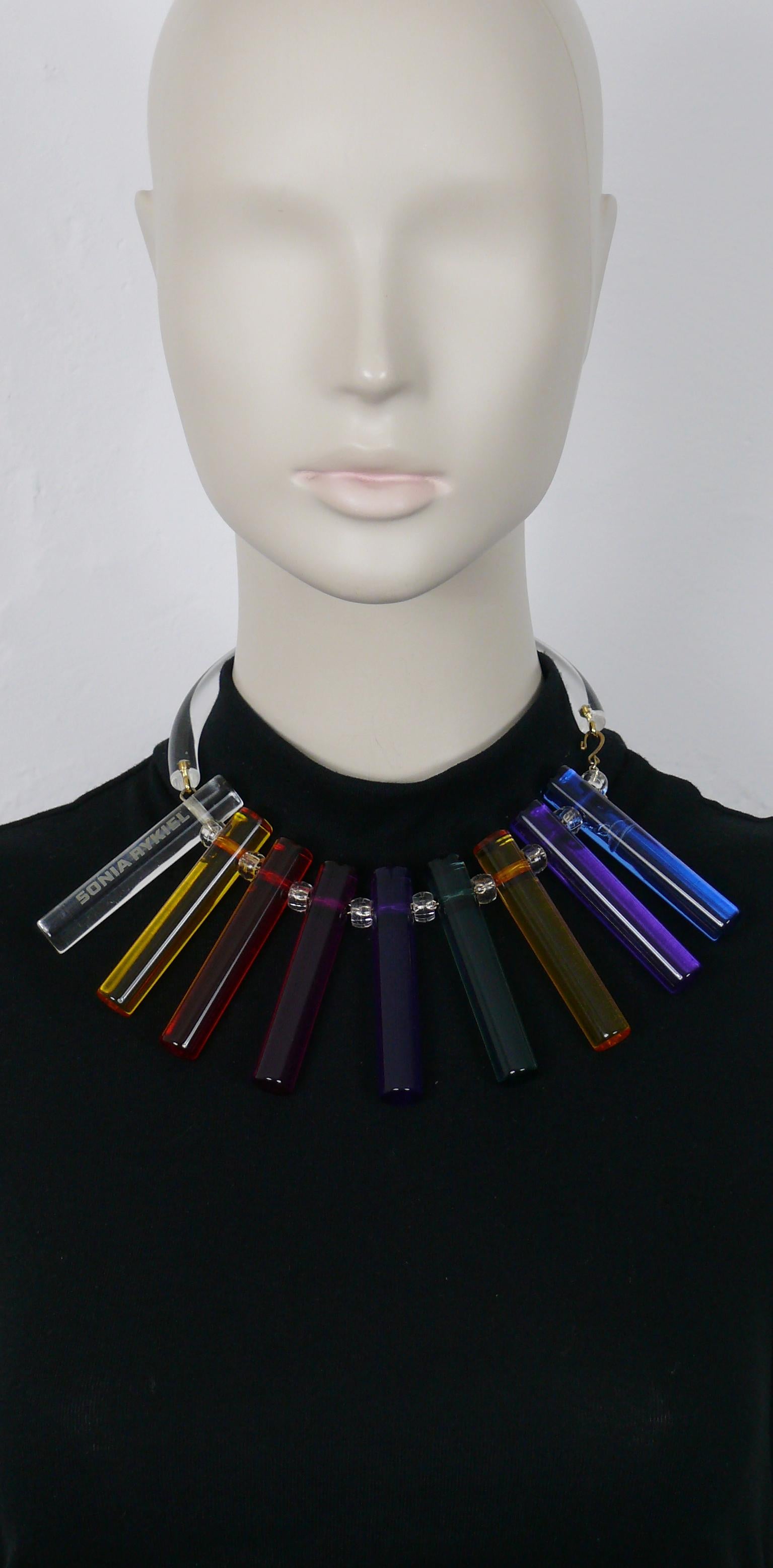 SONIA RYKIEL space age bib necklace featuring multi colored rainbow lucite tubes. 

Hook clasp closure.

Embossed SONIA RYKIEL.

Indicative measurements : inner circumference approx. 38.96 cm (15.34 inches) / length of the tubes approx. 7.2 cm (2.83