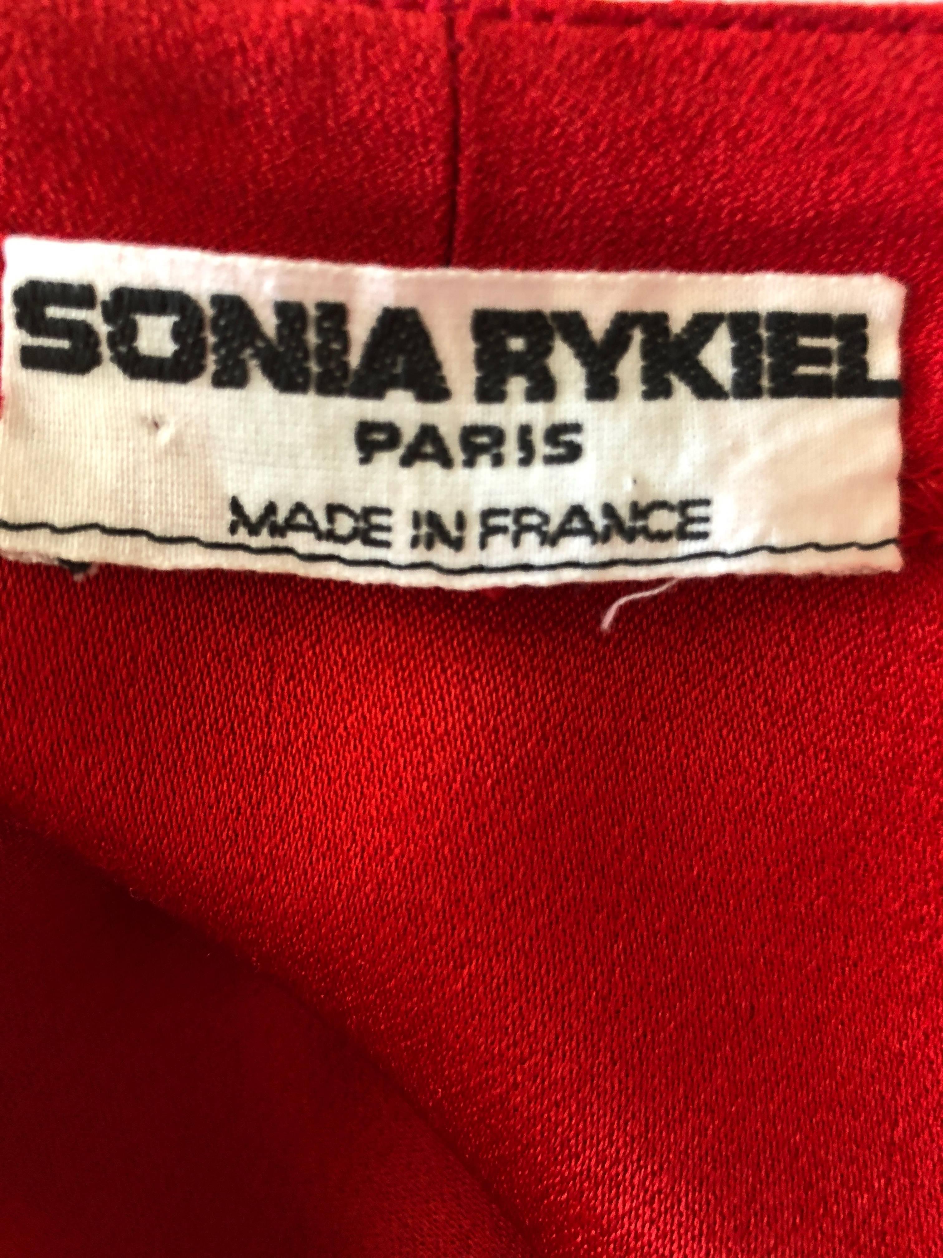 Sonia Rykiel Unusual Vintage 1980's Red Side Slashed Kimono Style Coat
Very voluminous, with  open sides.
Bust 60
