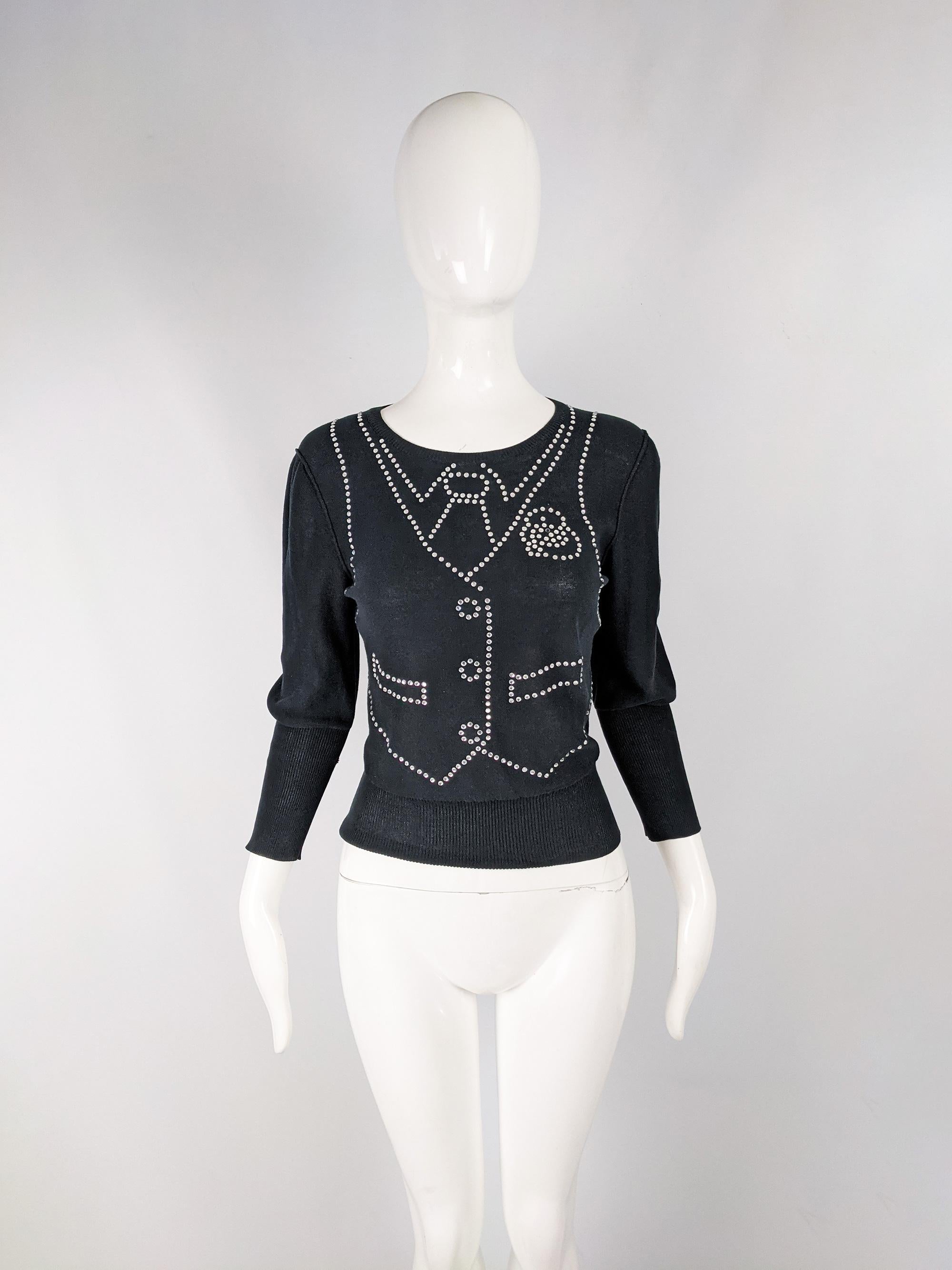 A cute vintage womens jumper from the 80s by luxury French fashion designer, Sonia Rykiel. In a black knit fabric with an amazing rhinestone pattern creating a trompe l'oeil effect of a waistcoat and shirt. It has long ribbed cuffs and a long ribbed