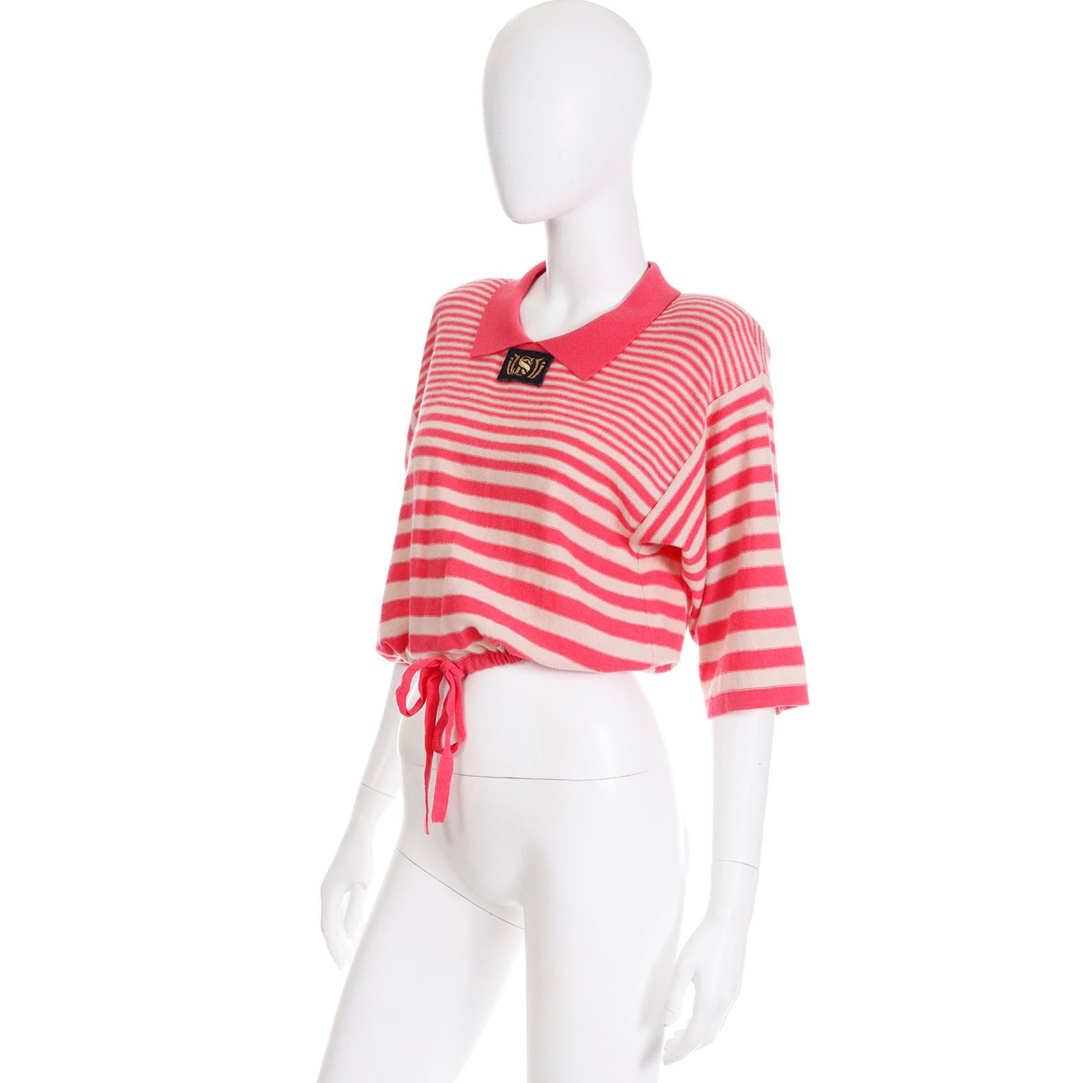red and pink striped sweater