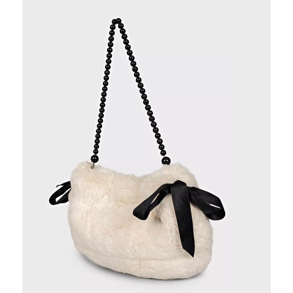 Aggiungi un tocco di lusso al tuo abbigliamento con questa elegante borsa crossbody di Sonia Rykiel! Realizzata in Italia con vera pelliccia di coniglio bianco, questa borsa farà sicuramente scalpore. 

Caratteristiche:

- Esterno in morbida