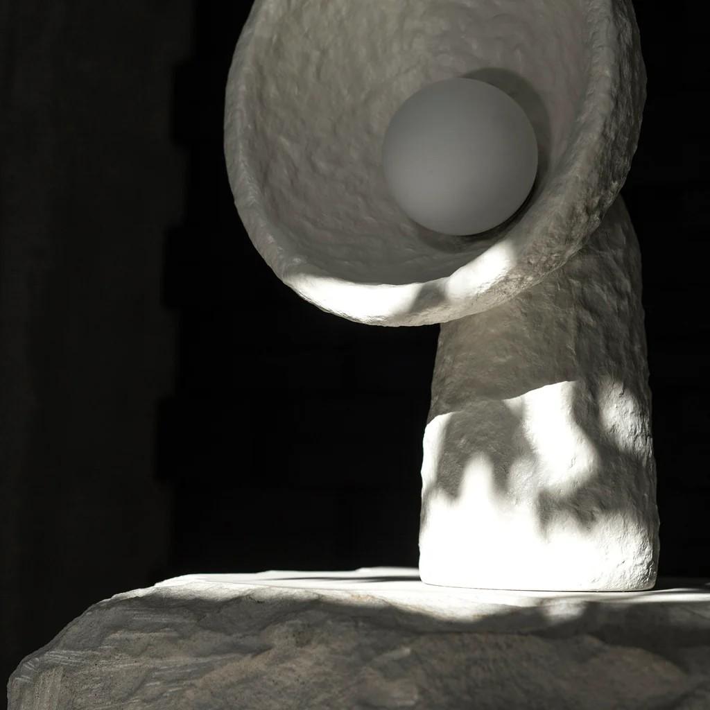 SONIAH / Ukrainian for sunflower / a symbol of prolific Ukrainian earth.

The table lamp is crafted by hand in FAINA’s sustainable material — ZTISTA. Sculptural SONIAH lamps stem from the ground, their pure shapes eliminate the excess and shine
