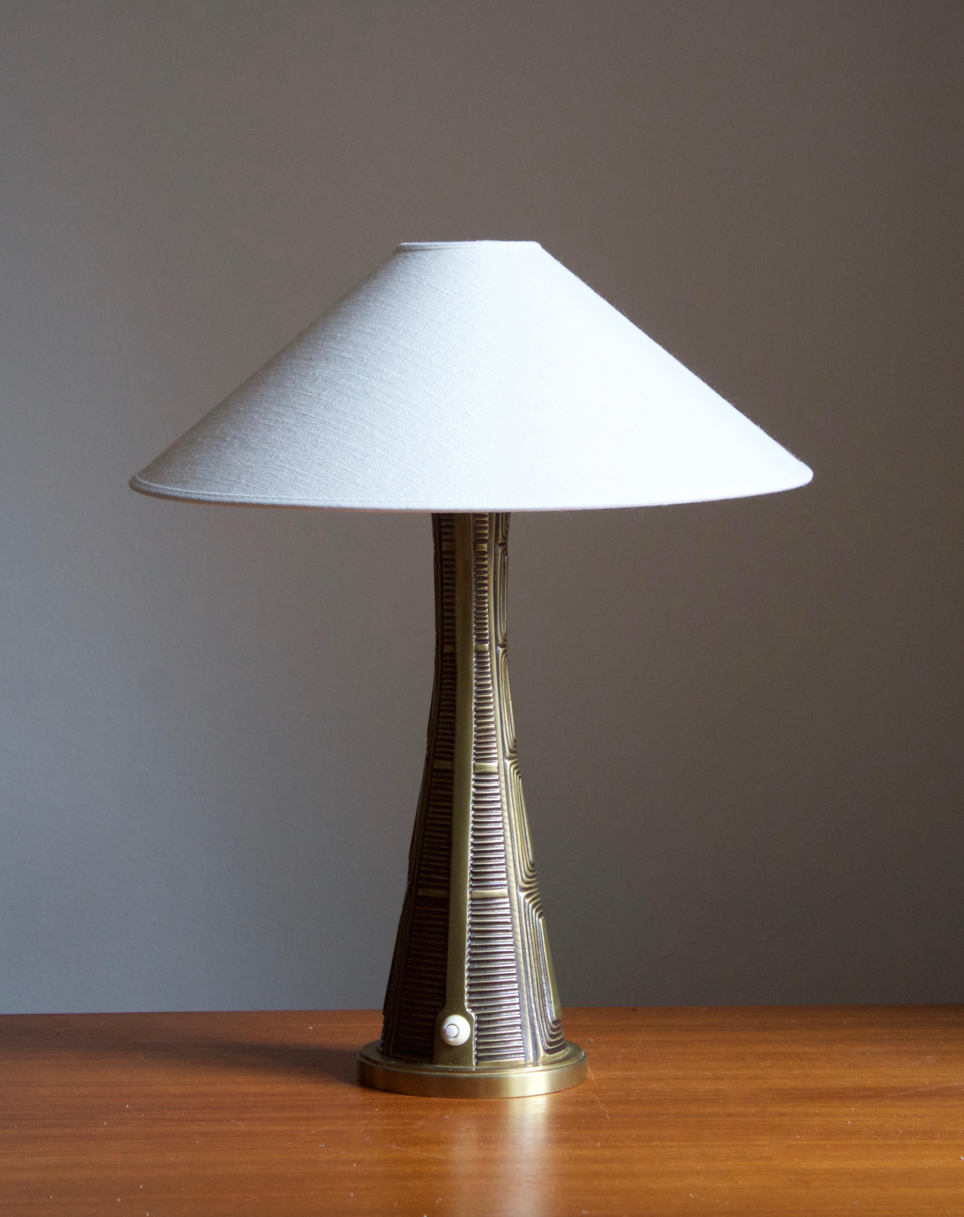A table lamp / desk light. Designed by Swedish sculptor Sonja Katzin, (1919-2014). Produced by ASEA, Sweden, 1950s. Stamped.

Stated dimensions exclude lampshades. Height includes sockets. Sold without lampshade.