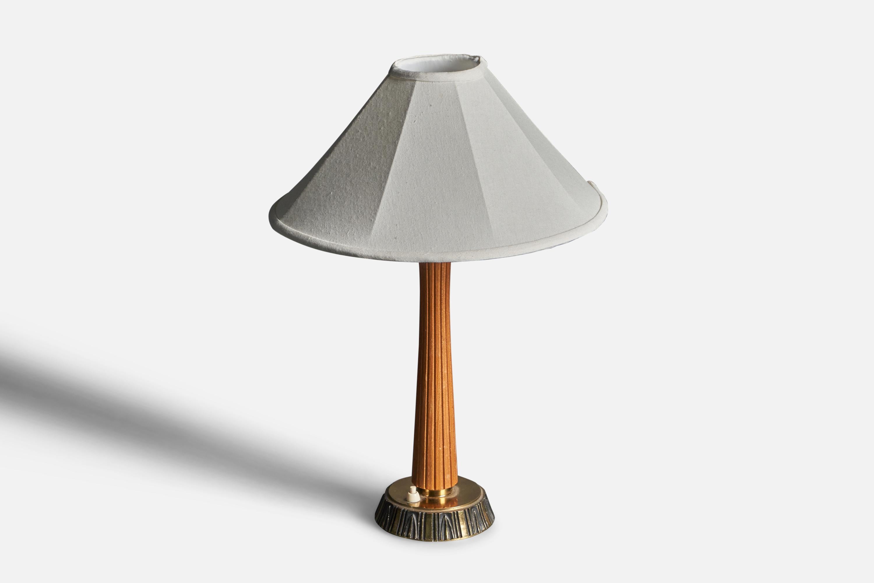 A table lamp / desk light. Designed by Swedish sculptor Sonja Katzin, (1919-2014). Produced by ASEA, Sweden, 1950s. Stamped.

Stated dimensions exclude lampshade. Height includes sockets. Sold without lampshade.