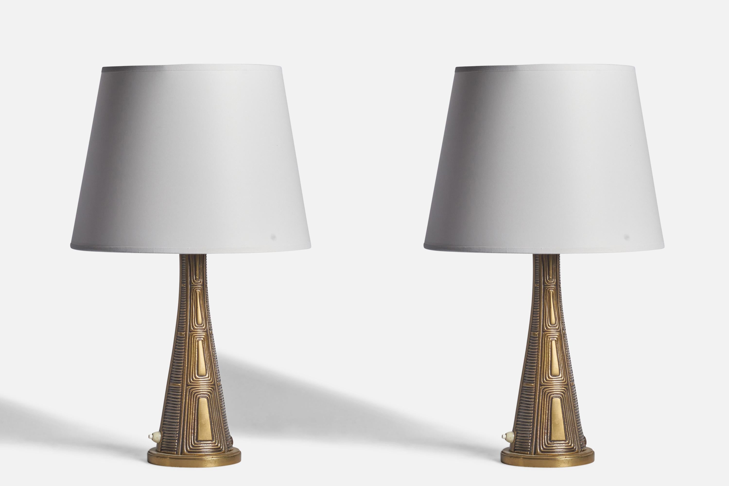 A pair of brass table lamps designed by Sonja Katzin and produced by ASEA, Sweden, c. 1940s.

Dimensions of Lamp (inches): 14.5” H x 4.6” Diameter
Dimensions of Shade (inches): 9” Top Diameter x 12” Bottom Diameter x 9” H
Dimensions of Lamp with