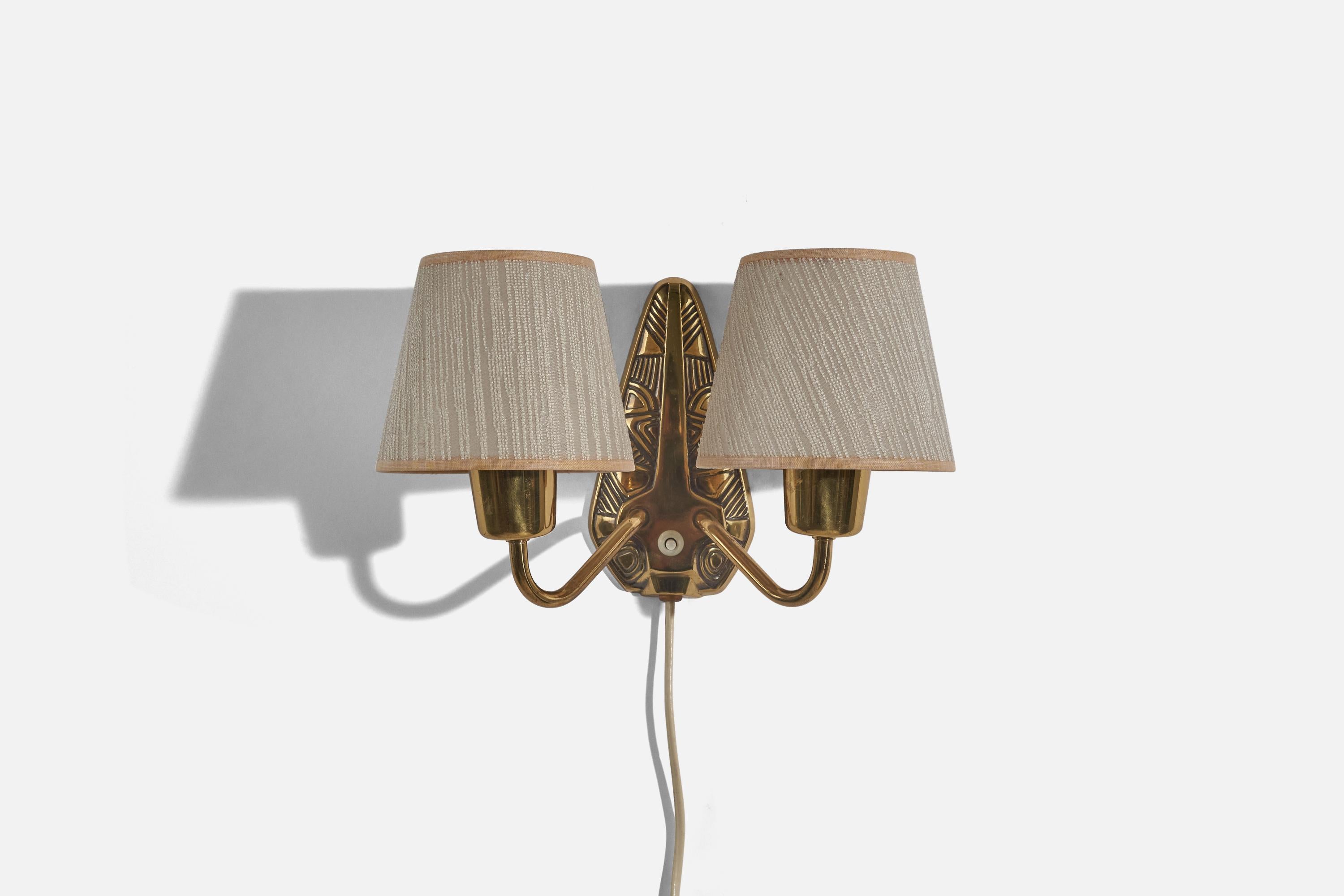 A brass and fabric wall light designed by Sonja Katzin and produced by ASEA, Sweden, 1940s. 

Lampshades can be purchased with the lamp. 
Dimensions of back plate (inches) : 7.43 x 3.87 x 0.31 (H x W x D).
