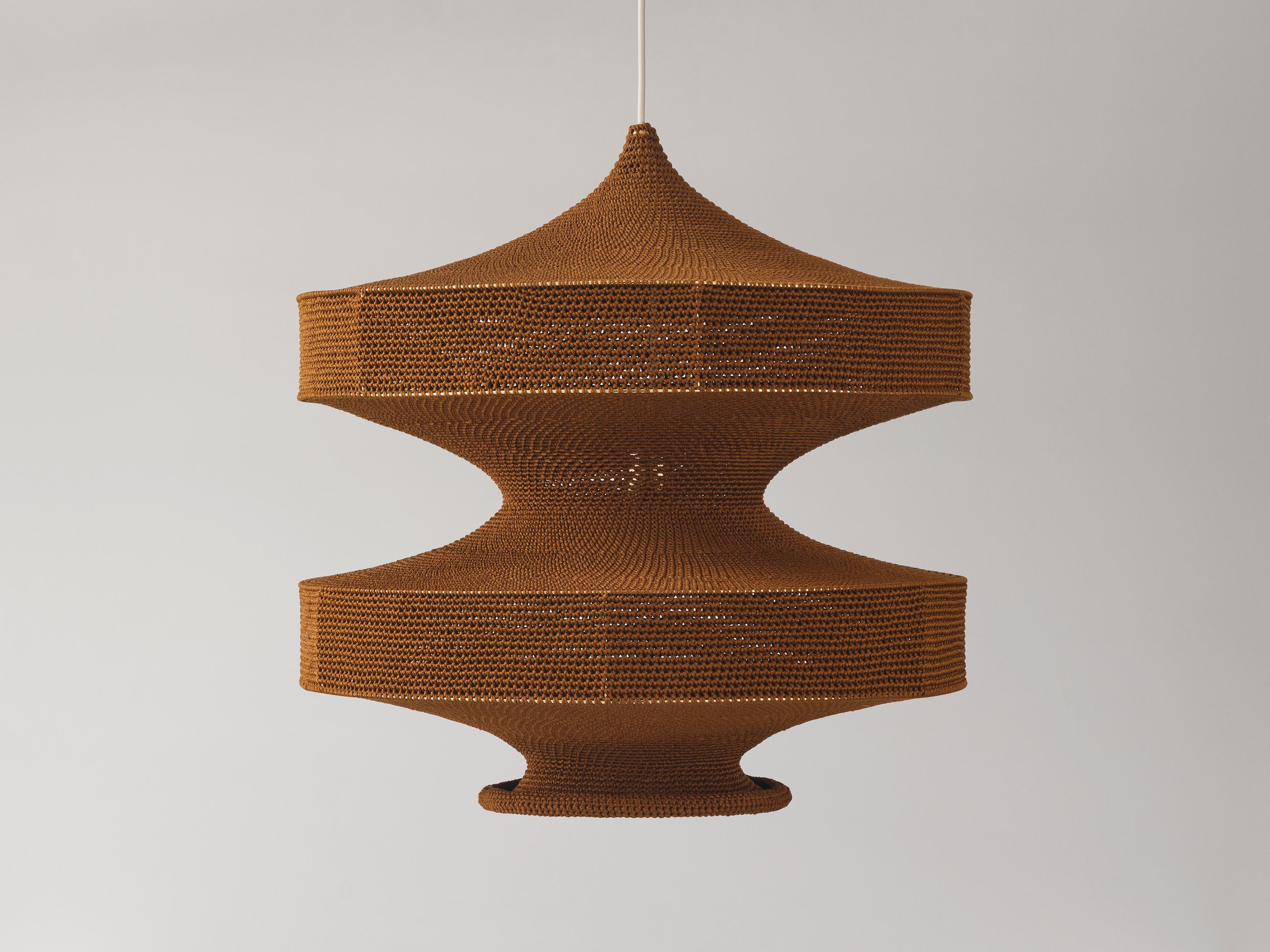 OMI collection are statement pendants, GLÜCK, SONNE and MONIKA. This is the original Naomi Paul lighting collection, launched in 2011.
A diffused atmospheric light. A statement pendant with presence that works well in a pair. In its smaller size