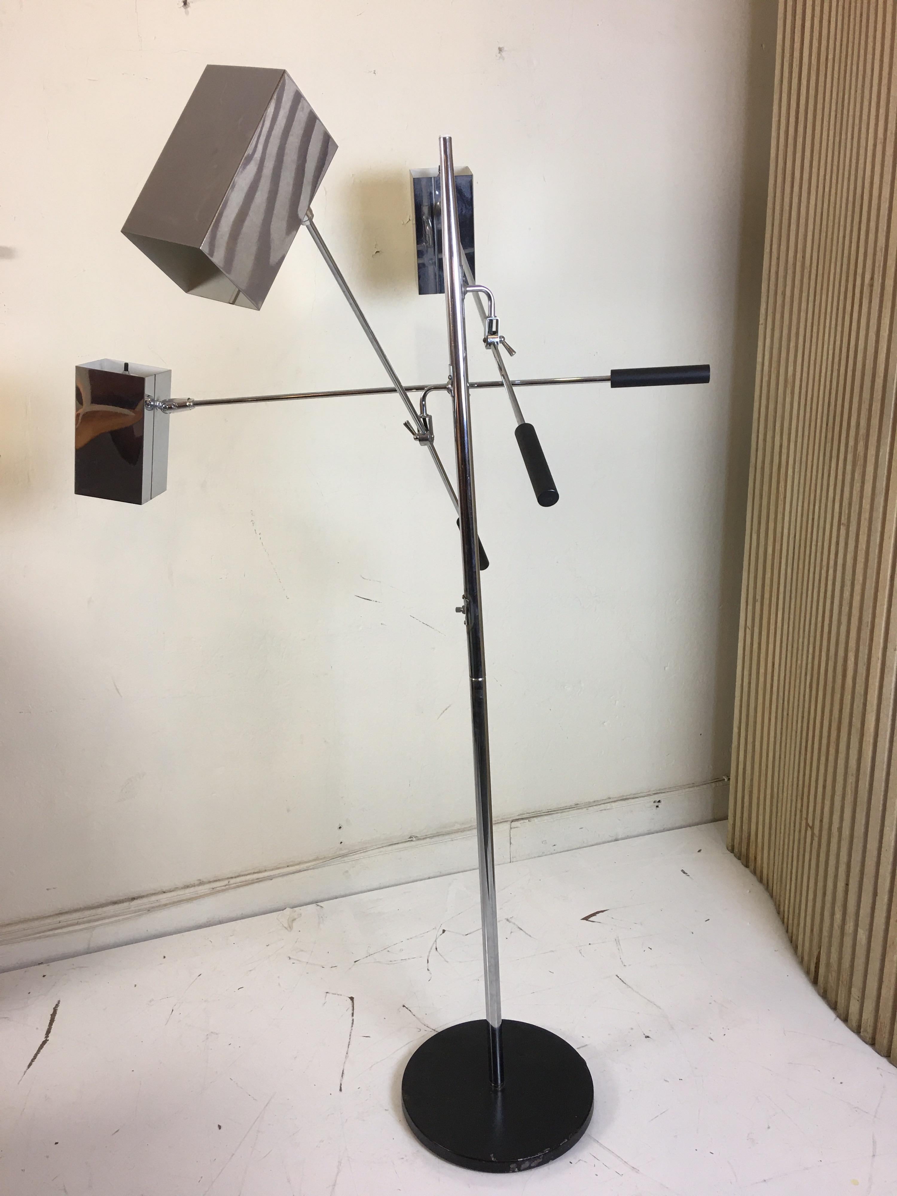 Sonneman lighting 3-arm floor lamp. Adjustable and movable square chrome shades with switches on shades and on pole. Late 1960s, early 1970s design. Each arm has a tightening mechanism which allows shades to be placed in multiple positions.
