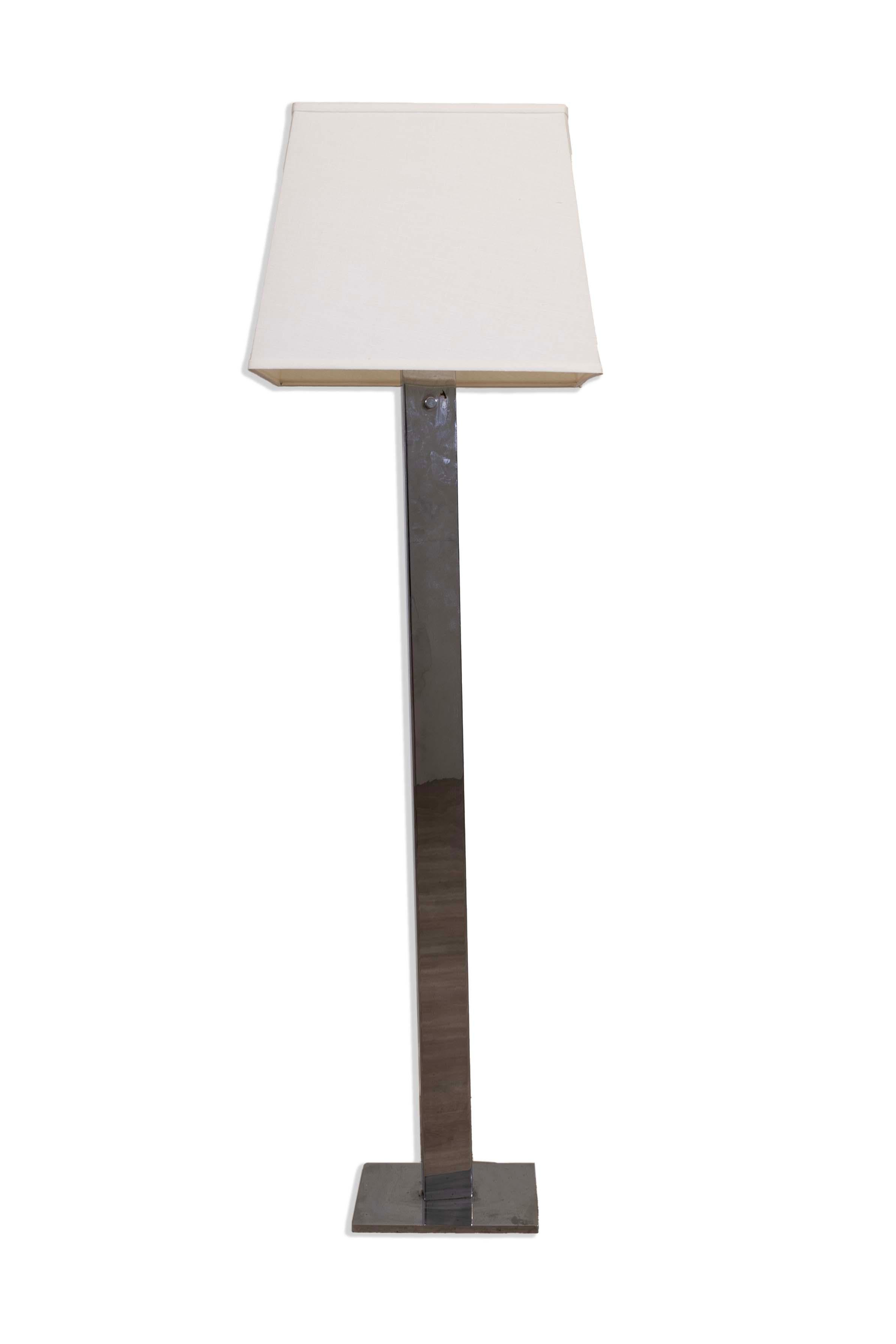 Elegant and versatile, this Sonneman Chrome Floor Lamp is a stunning example of postmodern design. Featuring a sleek chrome finish and a minimalist silhouette, this lamp adds a touch of sophistication to any room. With three adjustable settings, it