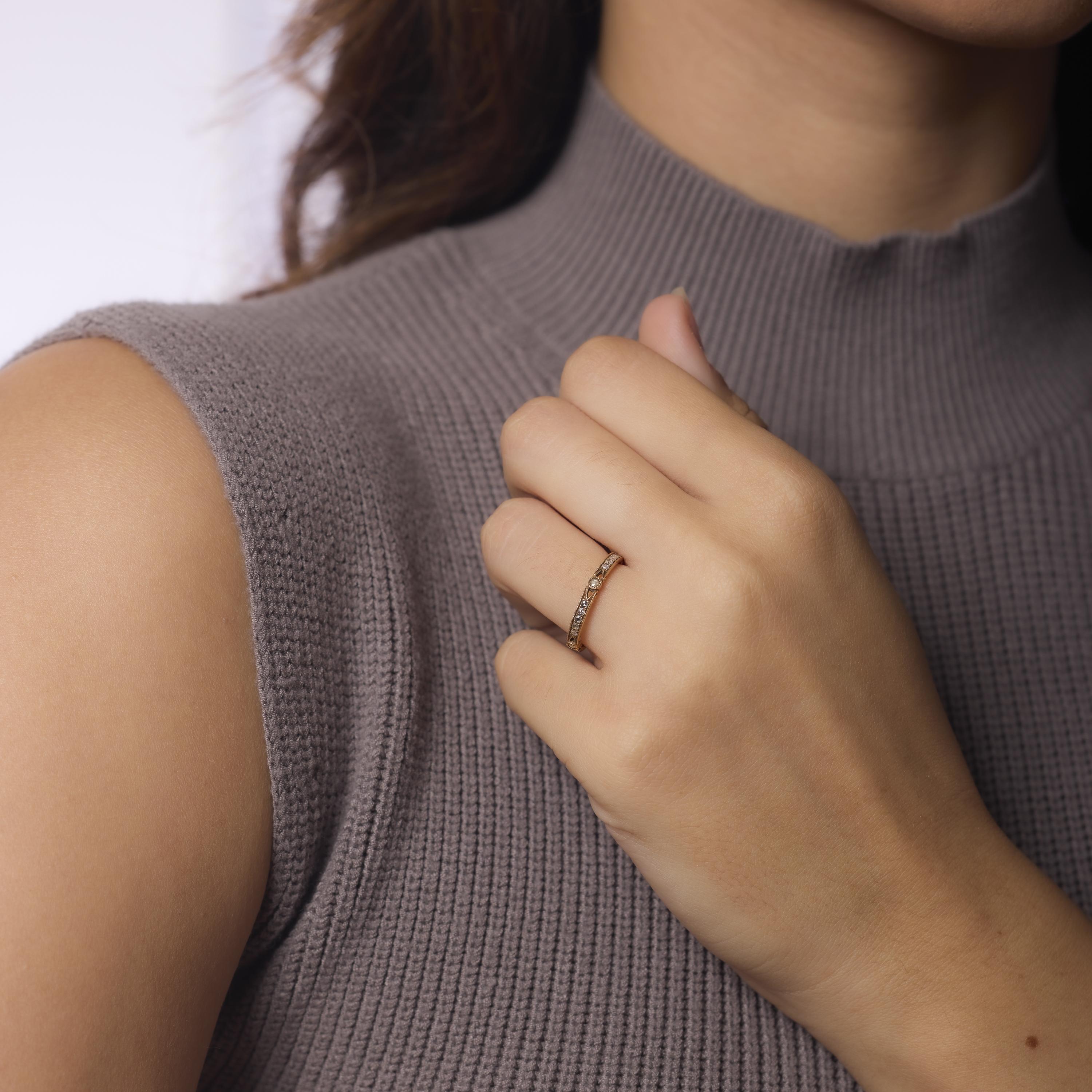 Sonoma is our handmade Trumpet & Horn exclusive wedding band reminiscent of the antique Etruscan Revival period. The ring is handcrafted in 18k gold brushed lightly with an oxidized finish featuring a continuous row of twenty-four Round Brilliant
