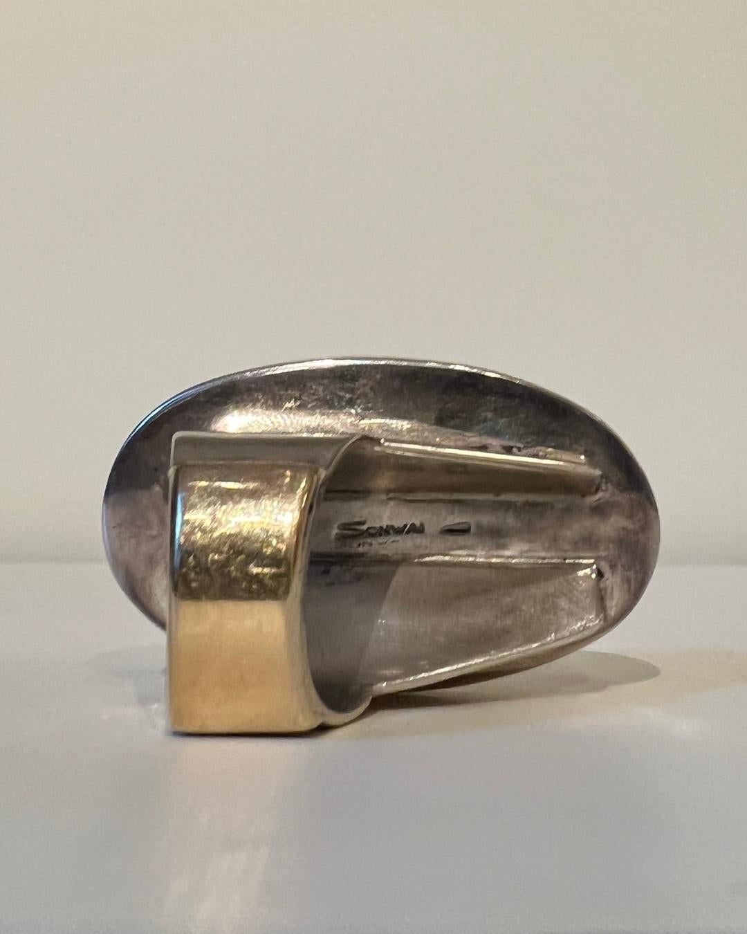 Women's or Men's Sonwai (Verma Nequetewa ) Royston Turquoise Silver and Gold Ring Circa 2018 For Sale