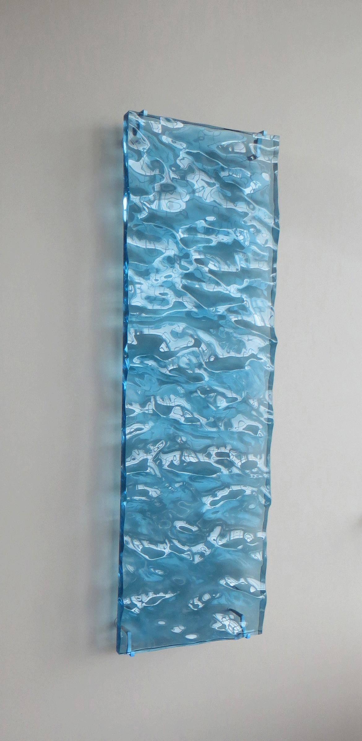 Carved Acrylic Sculpture (Blue)
48 x 15 x 2 inches
Edition 1 of 5

When Collier creates a new water surface she starts with a brush that she builds with software. This brush is essentially a model of wind because wind is the source of waves in the