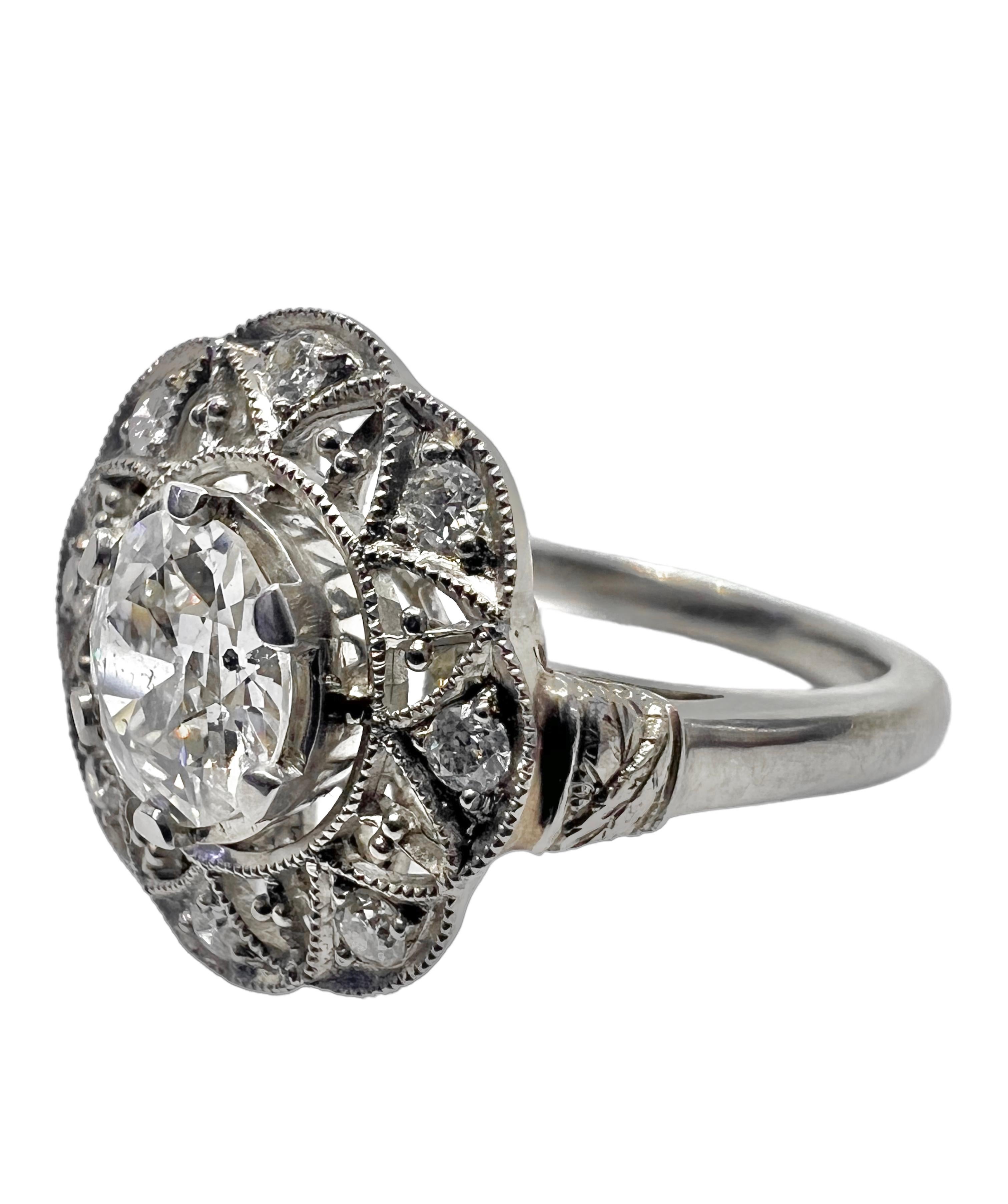 An art deco inspired platinum ring with 0.88 carat round cut center diamond and accented with .17 carat small round diamonds. 

Sophia D by Joseph Dardashti LTD has been known worldwide for 35 years and are inspired by classic Art Deco design that